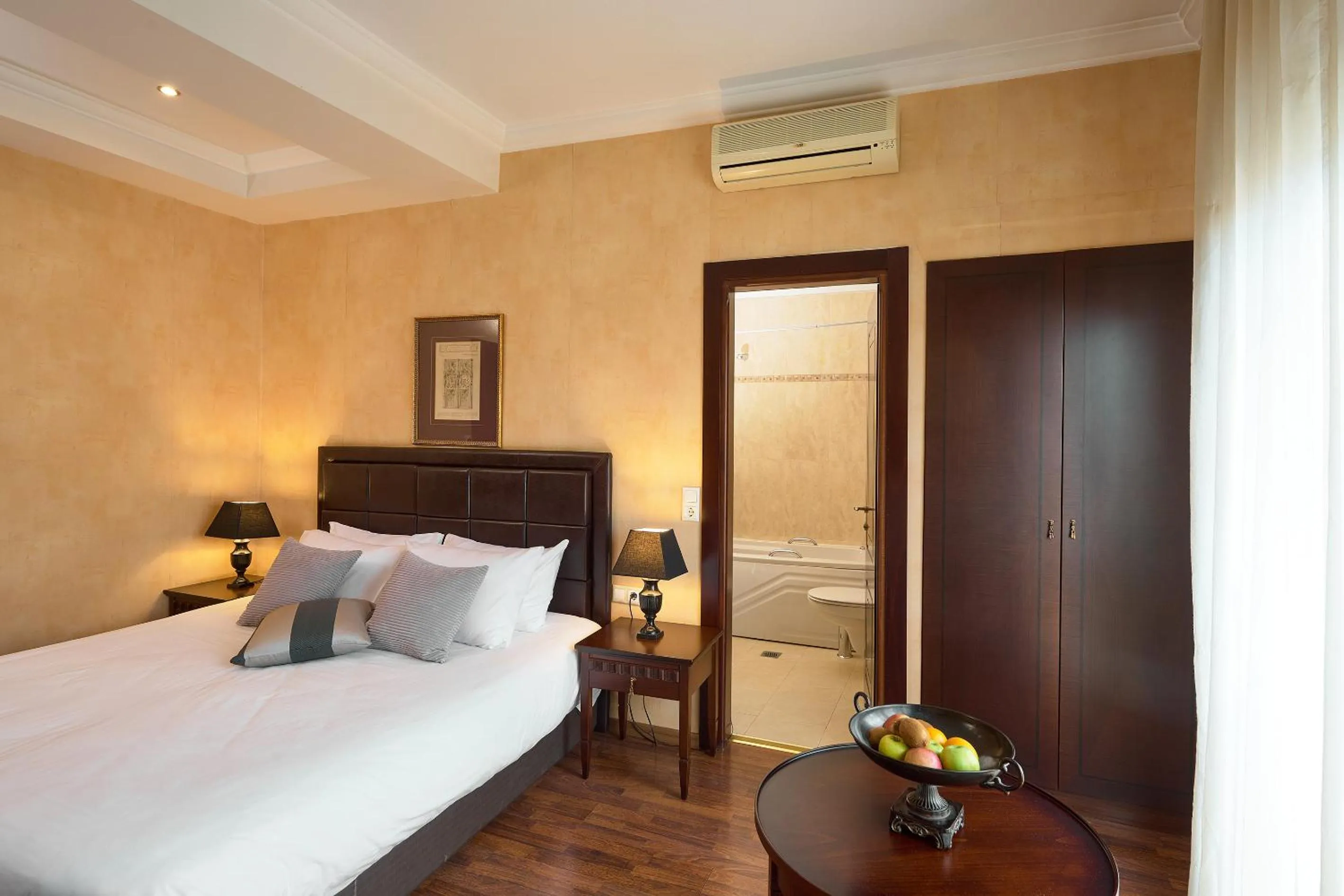 Bed in Olympus Mediterranean Boutique Hotel