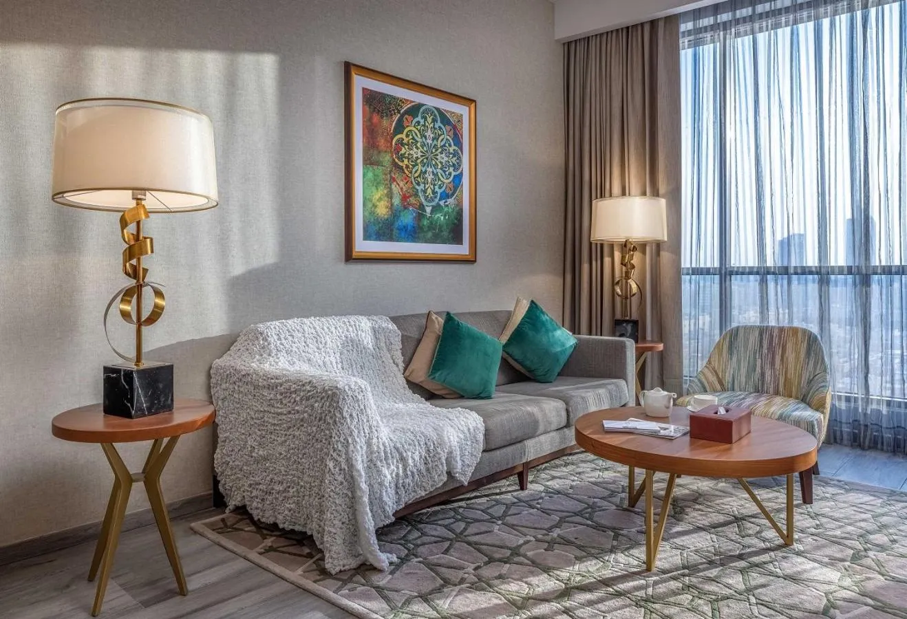 Living room, Bed in Ascott Corniche Al Khobar