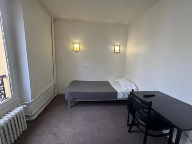 Bed in Hotel Chevallier