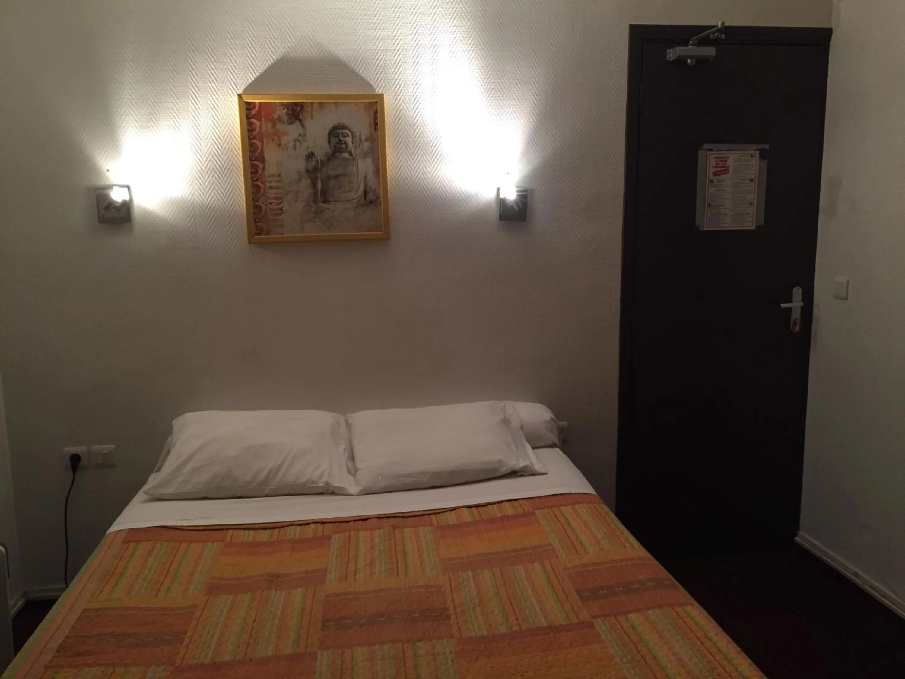 Bed in Hotel Chevallier