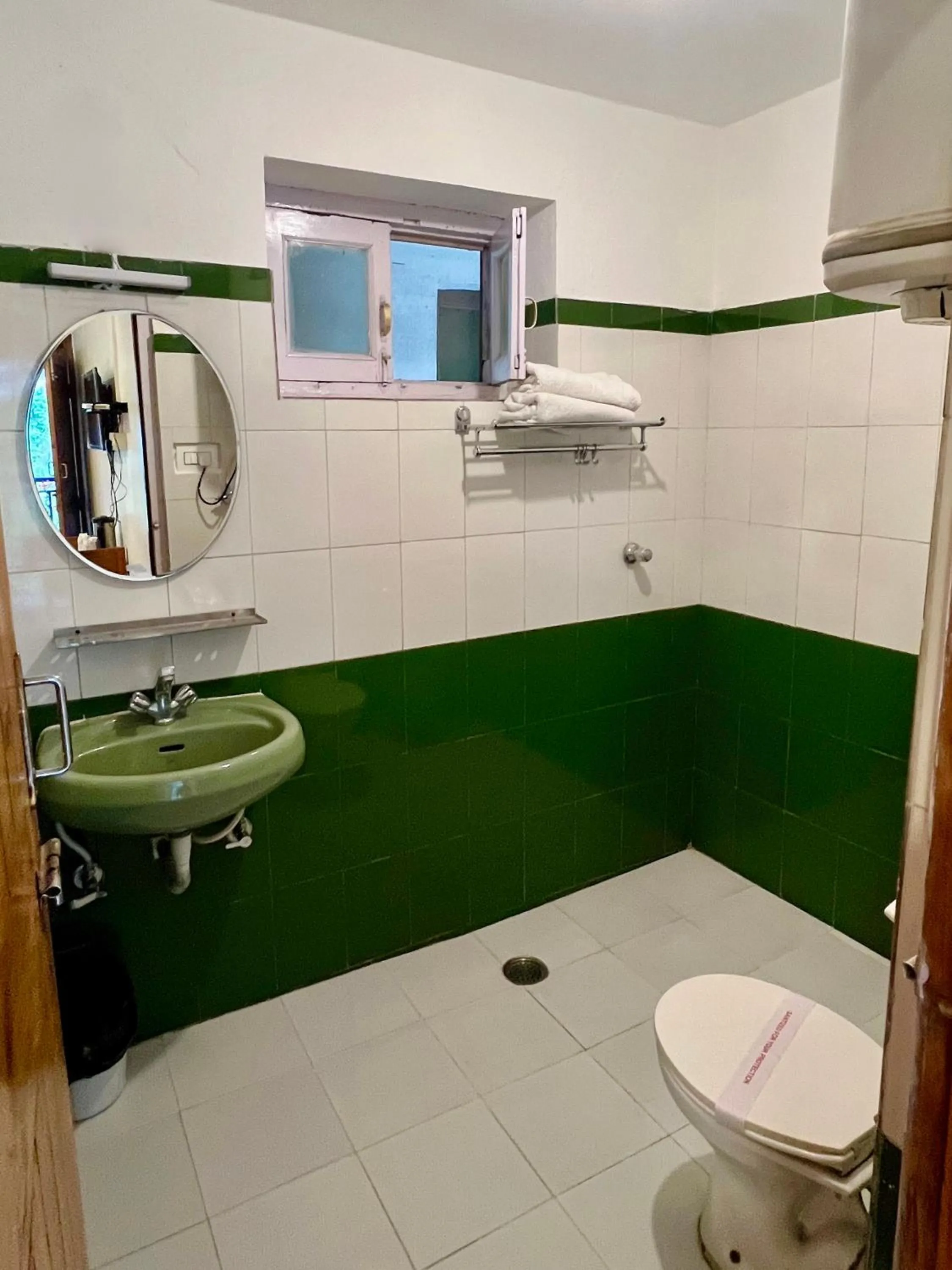 Bathroom in Tourist Hotel 10 minutes walking distance from the mall