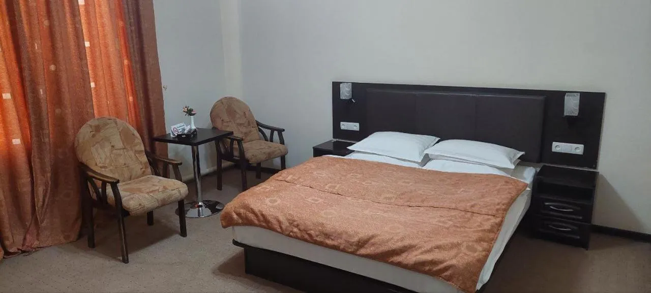 Bed in GRAND STAR HOTEL