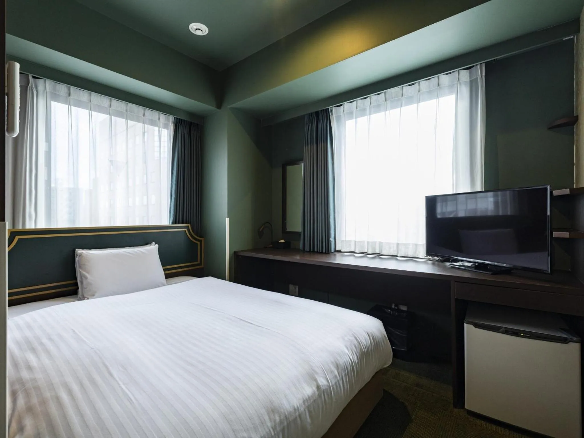 Bed in Hotel Wing International Select Kumamoto