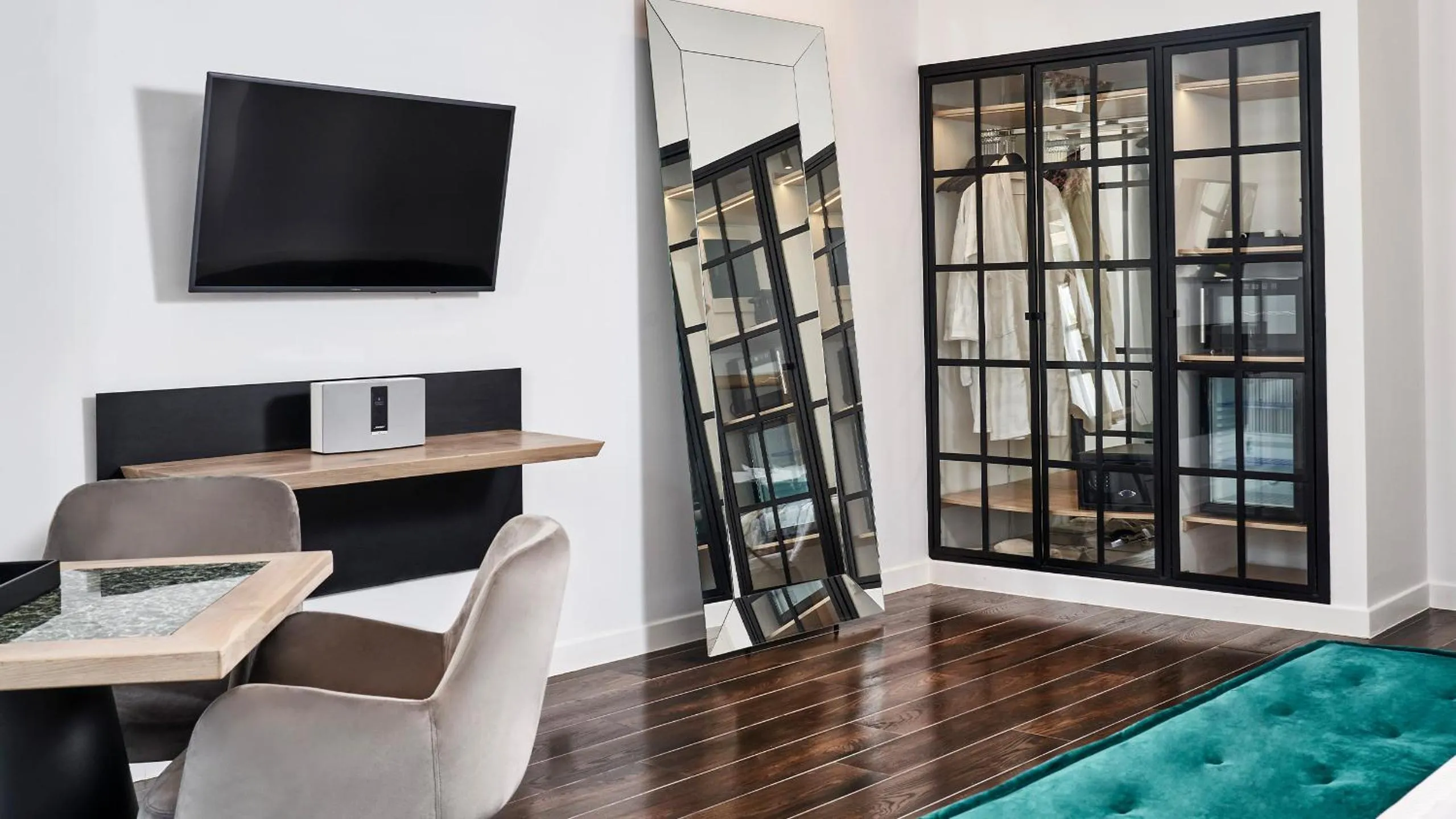 Seating area in Katikies Garden Santorini - The Leading Hotels Of The World