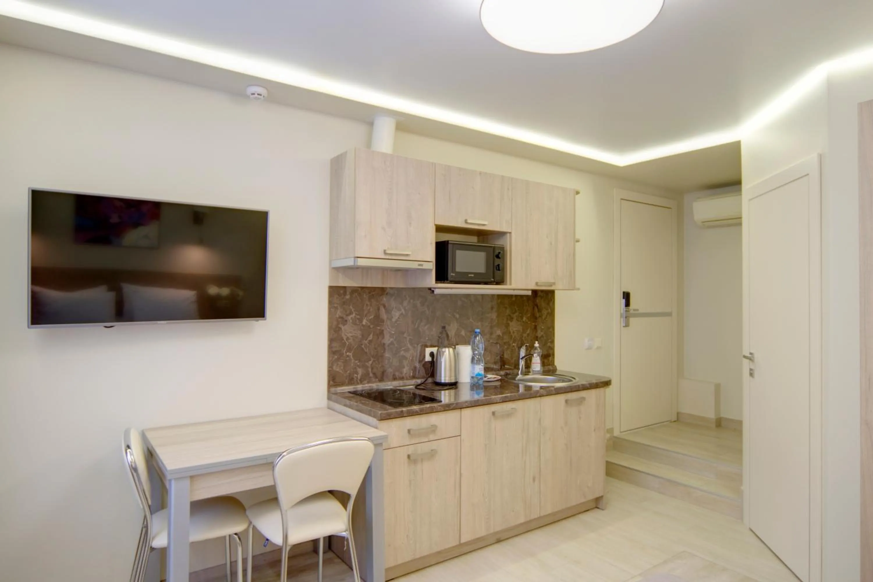 Kitchen or kitchenette in Arena Summit Apart Hotel