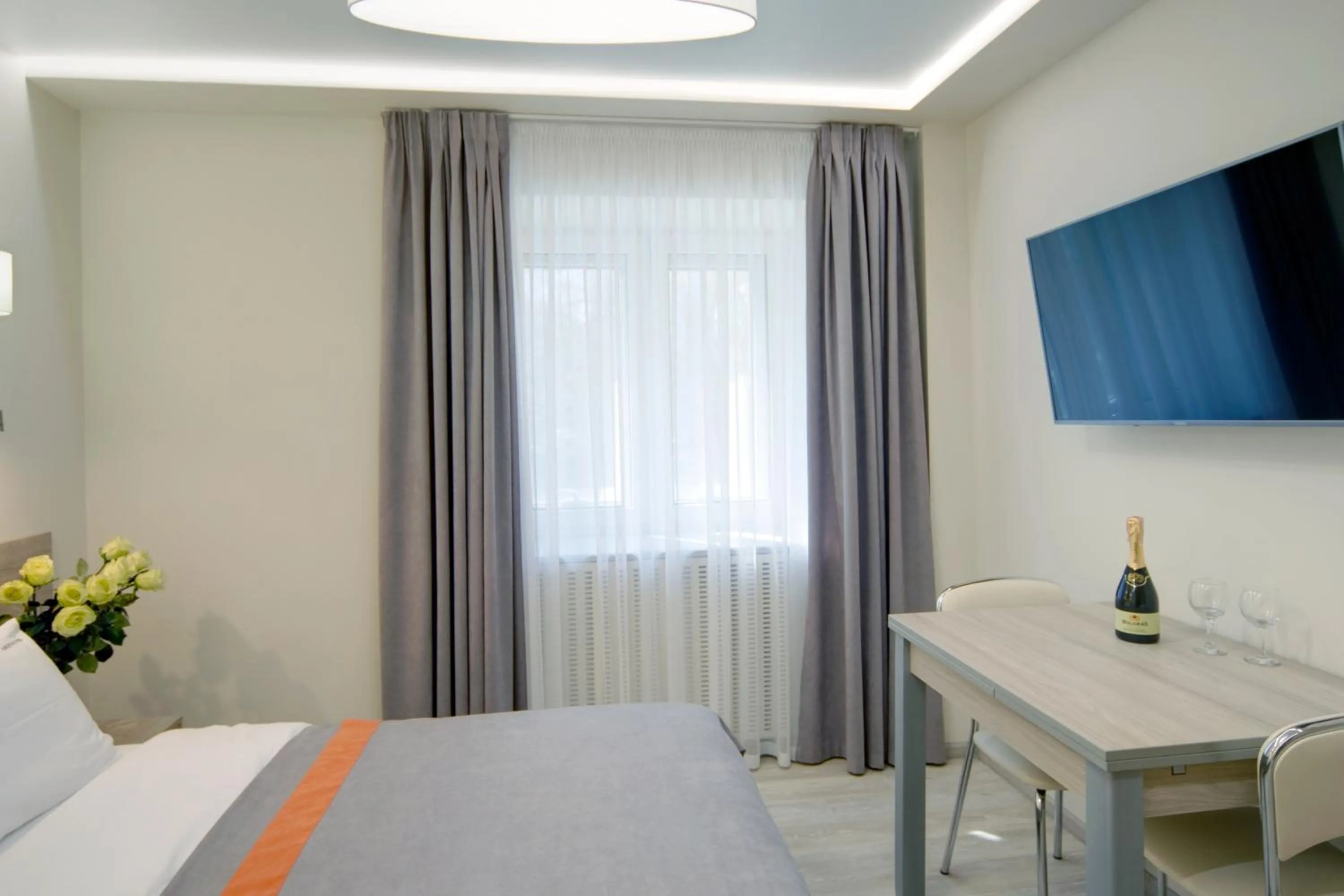 Communal lounge/ TV room, Bed in Arena Summit Apart Hotel