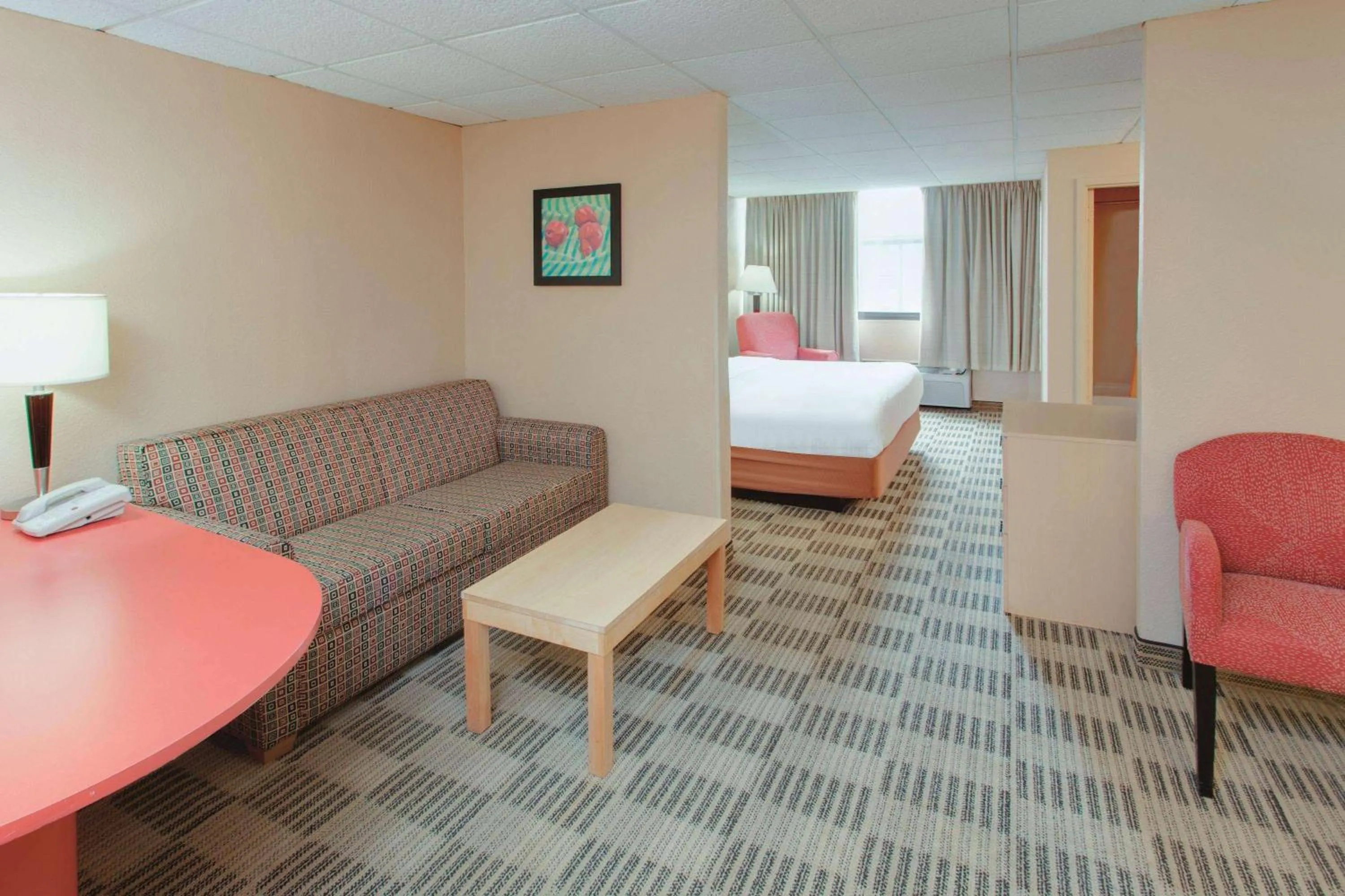 Photo of the whole room, Bed in Ramada Inn by Wyndham Fairfield NJ