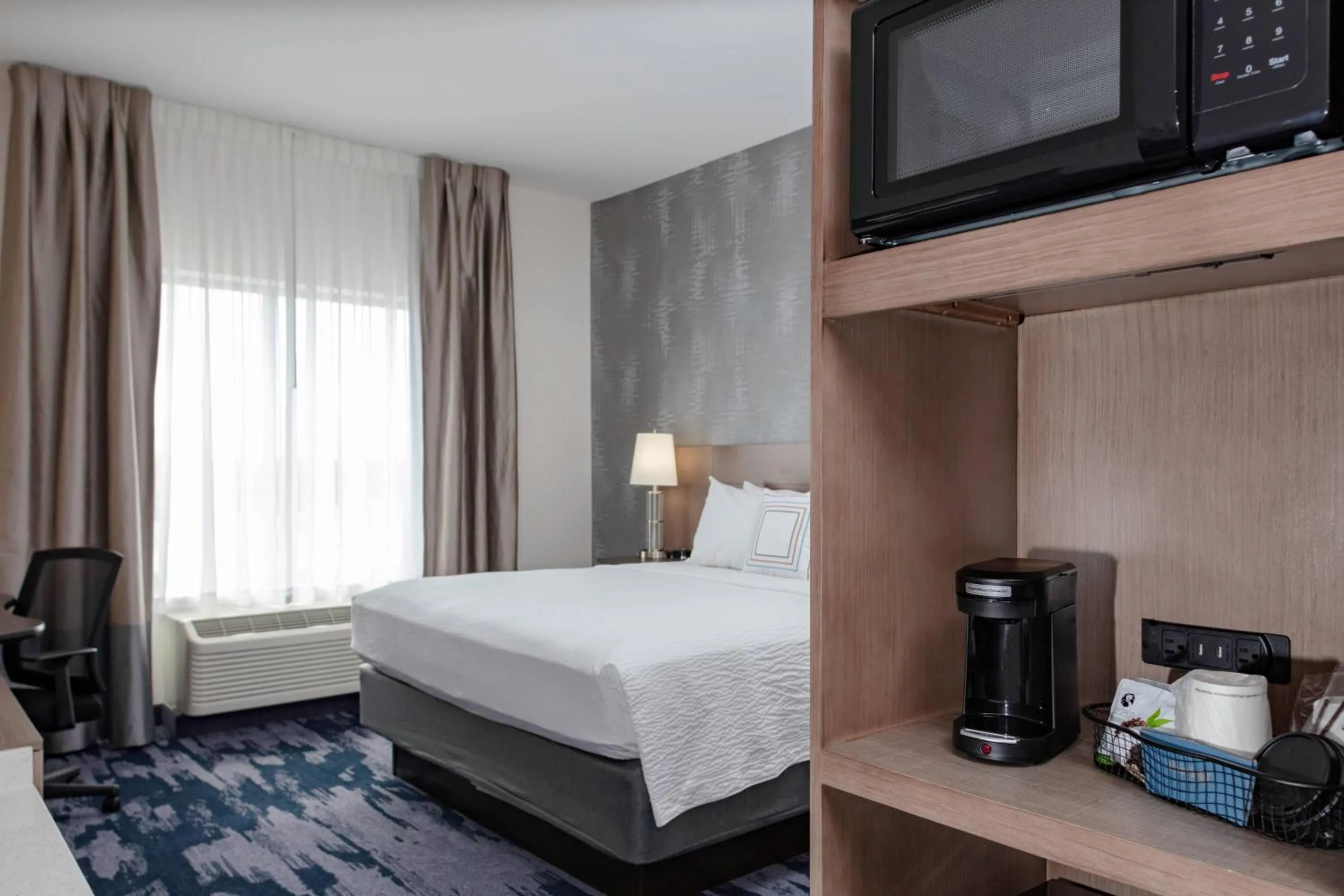 Photo of the whole room, Bed in Fairfield Inn & Suites Charlotte Pineville