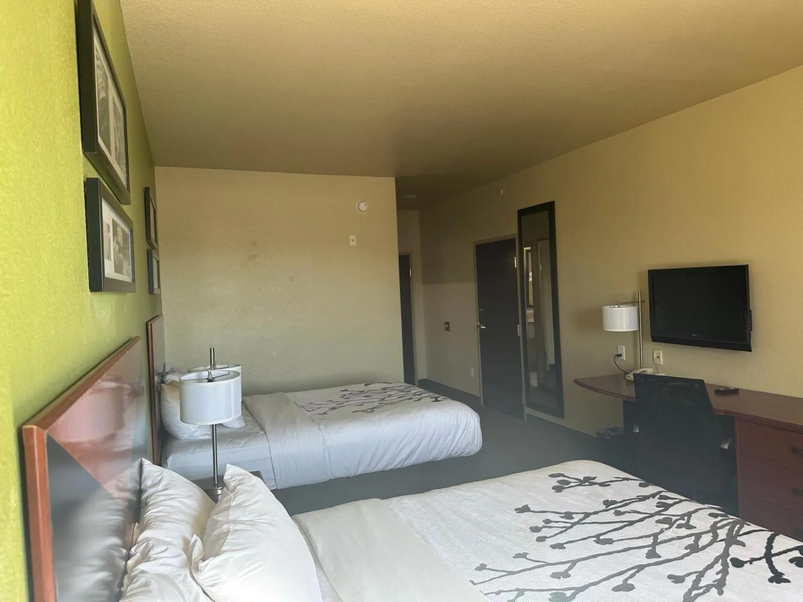 Bed in Sleep Inn & Suites at Six Flags