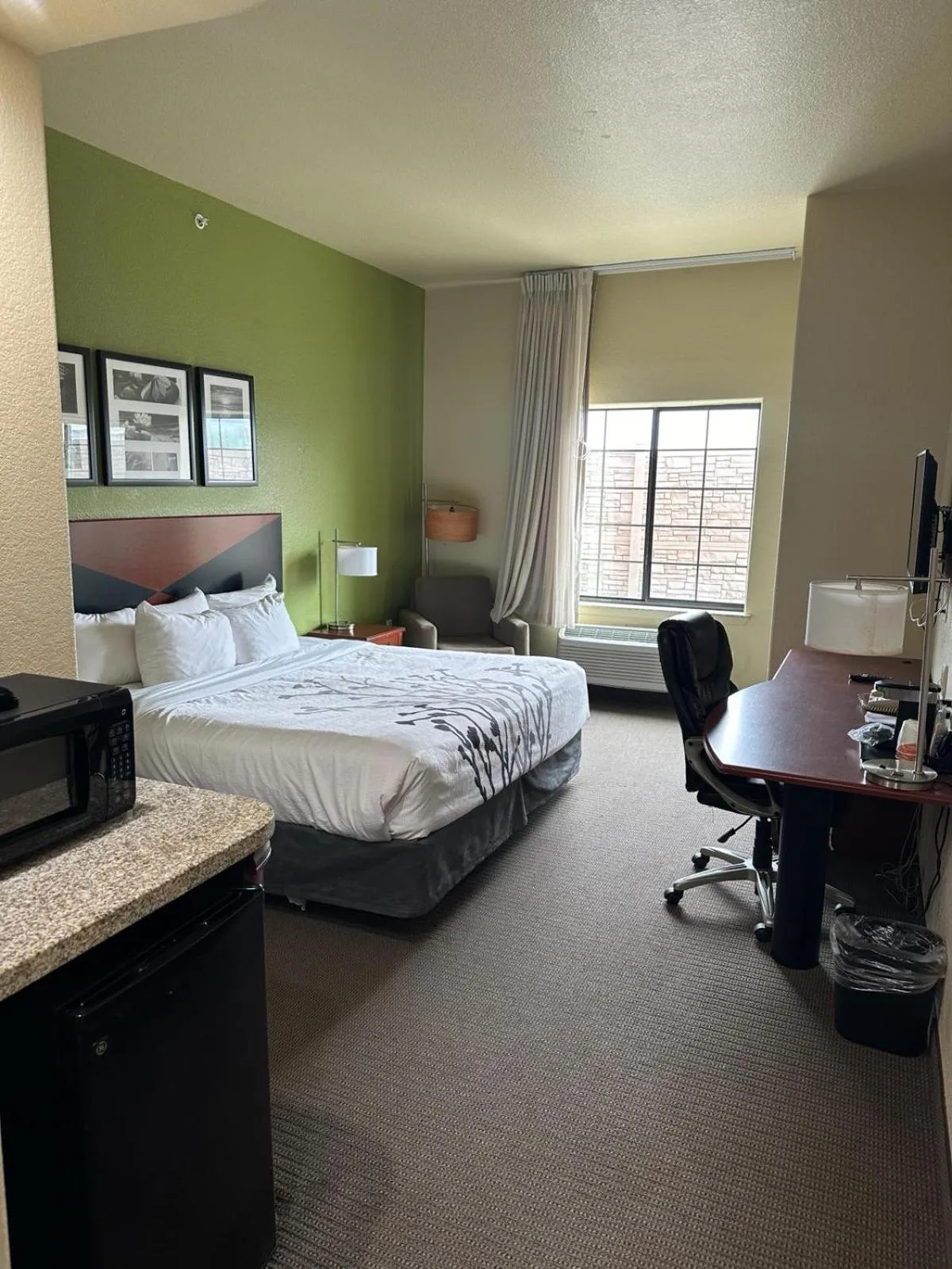 Bed in Sleep Inn & Suites at Six Flags