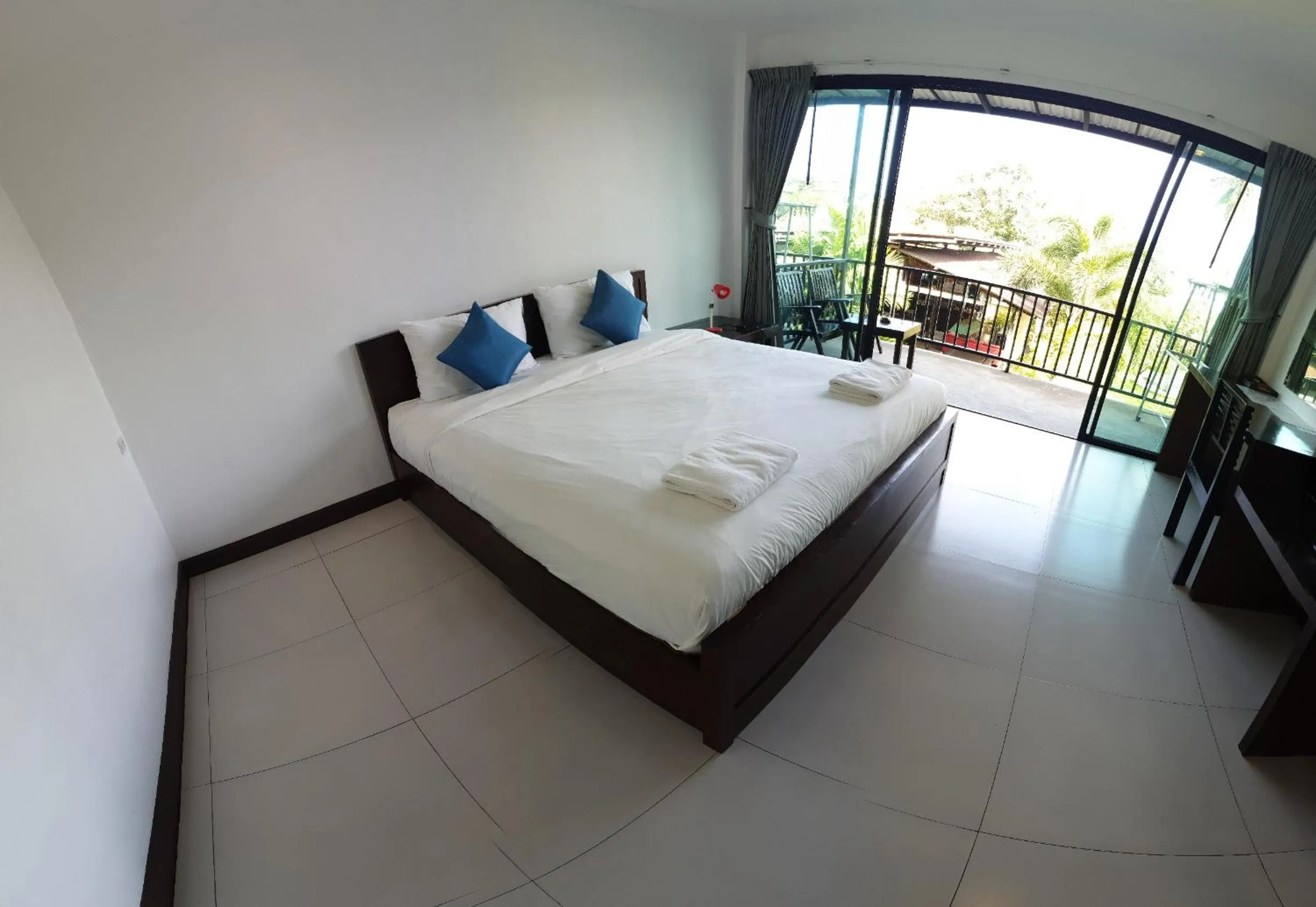 Bed in The Nidhra Boutique Resort