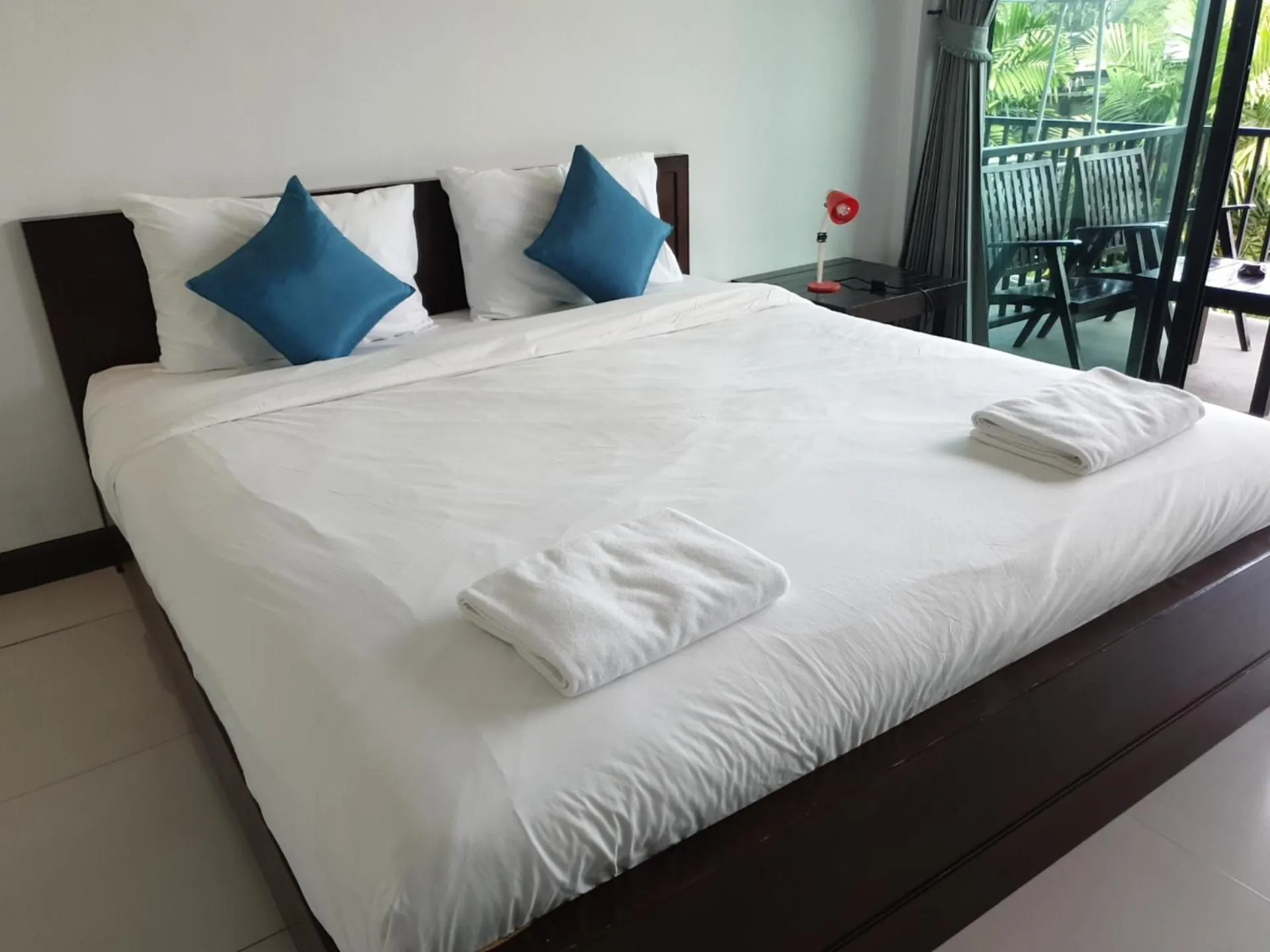 Bed in The Nidhra Boutique Resort