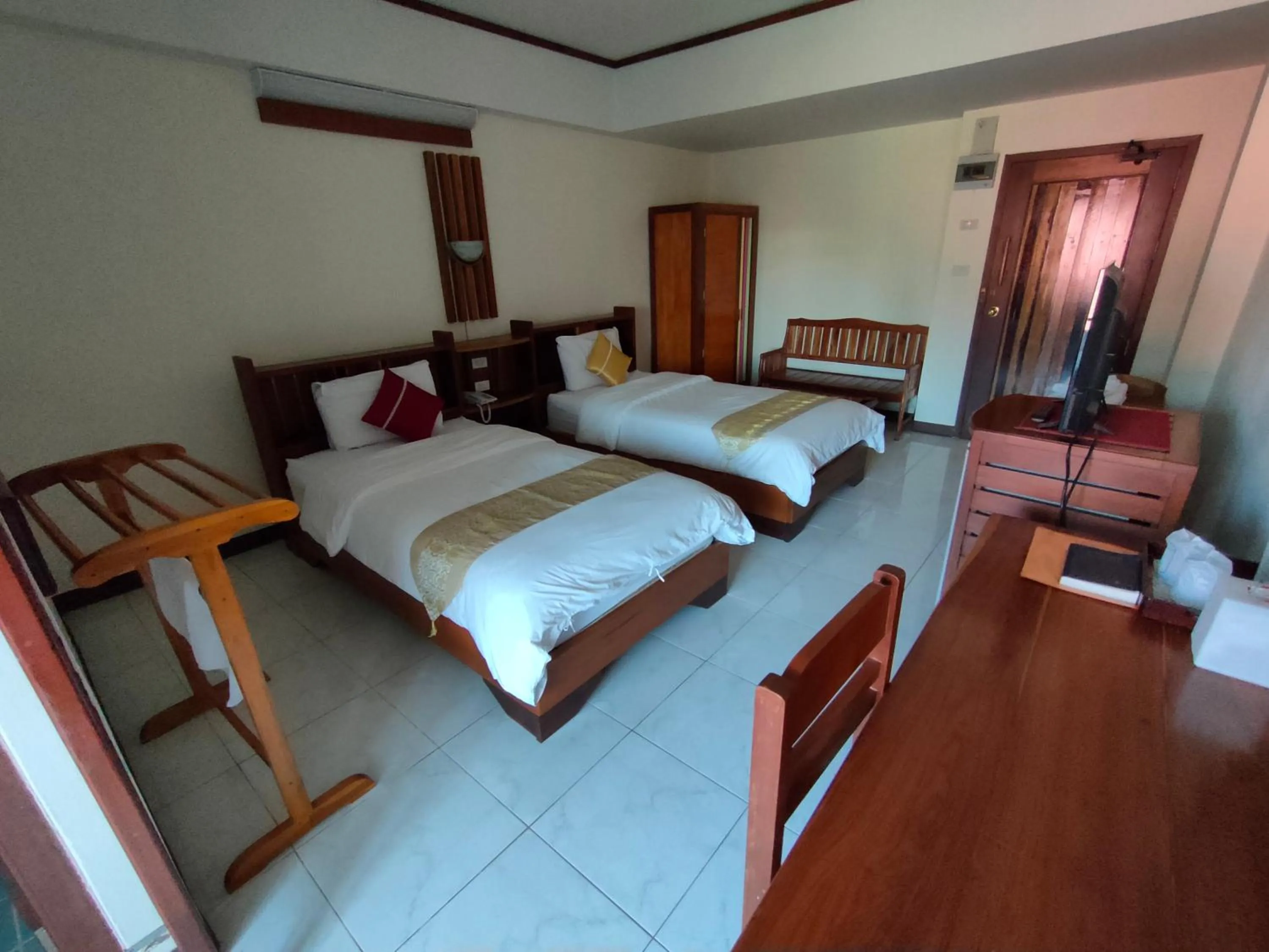 Bed in Riverfront Hotel Mukdahan