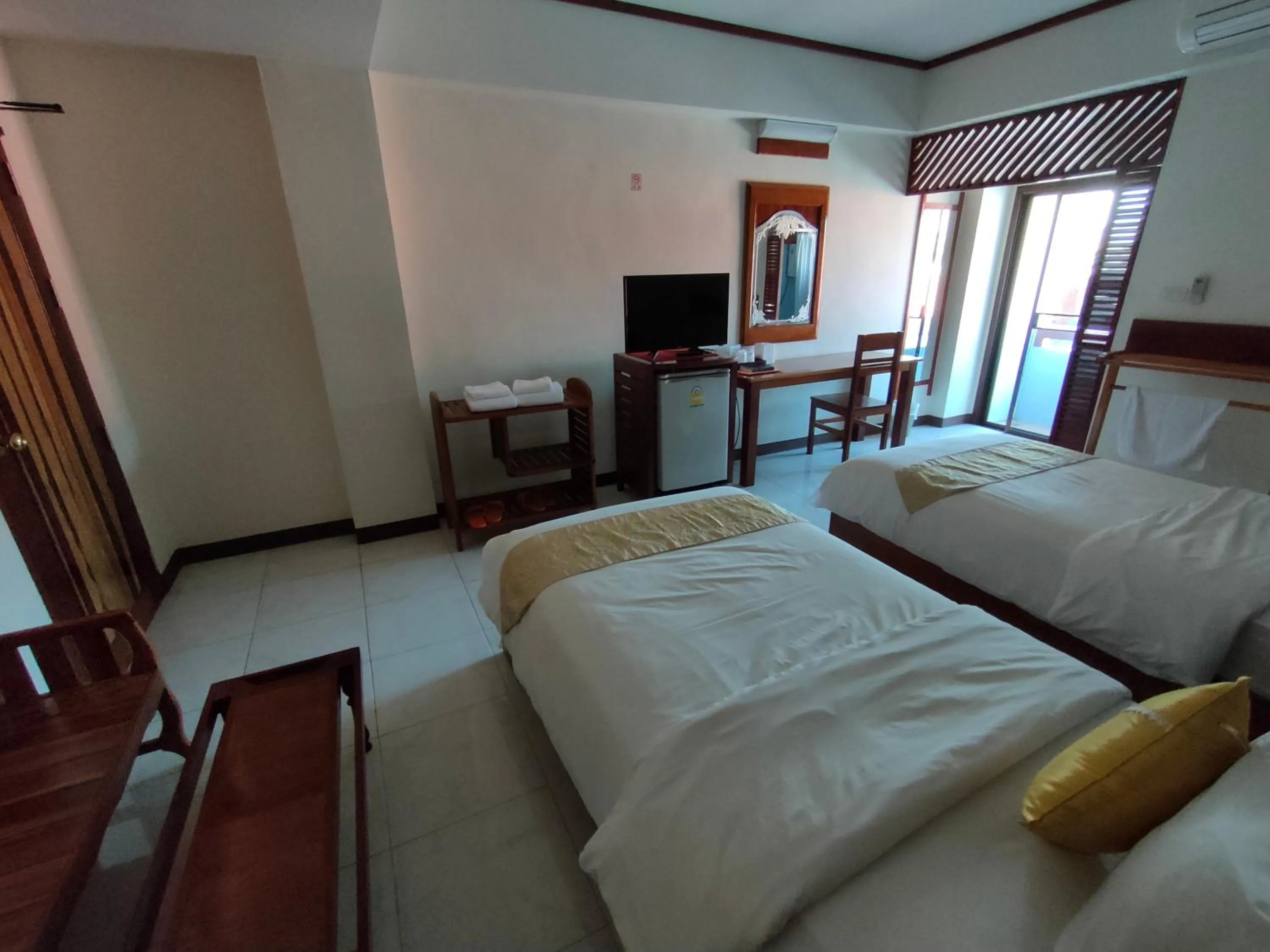 Bed in Riverfront Hotel Mukdahan