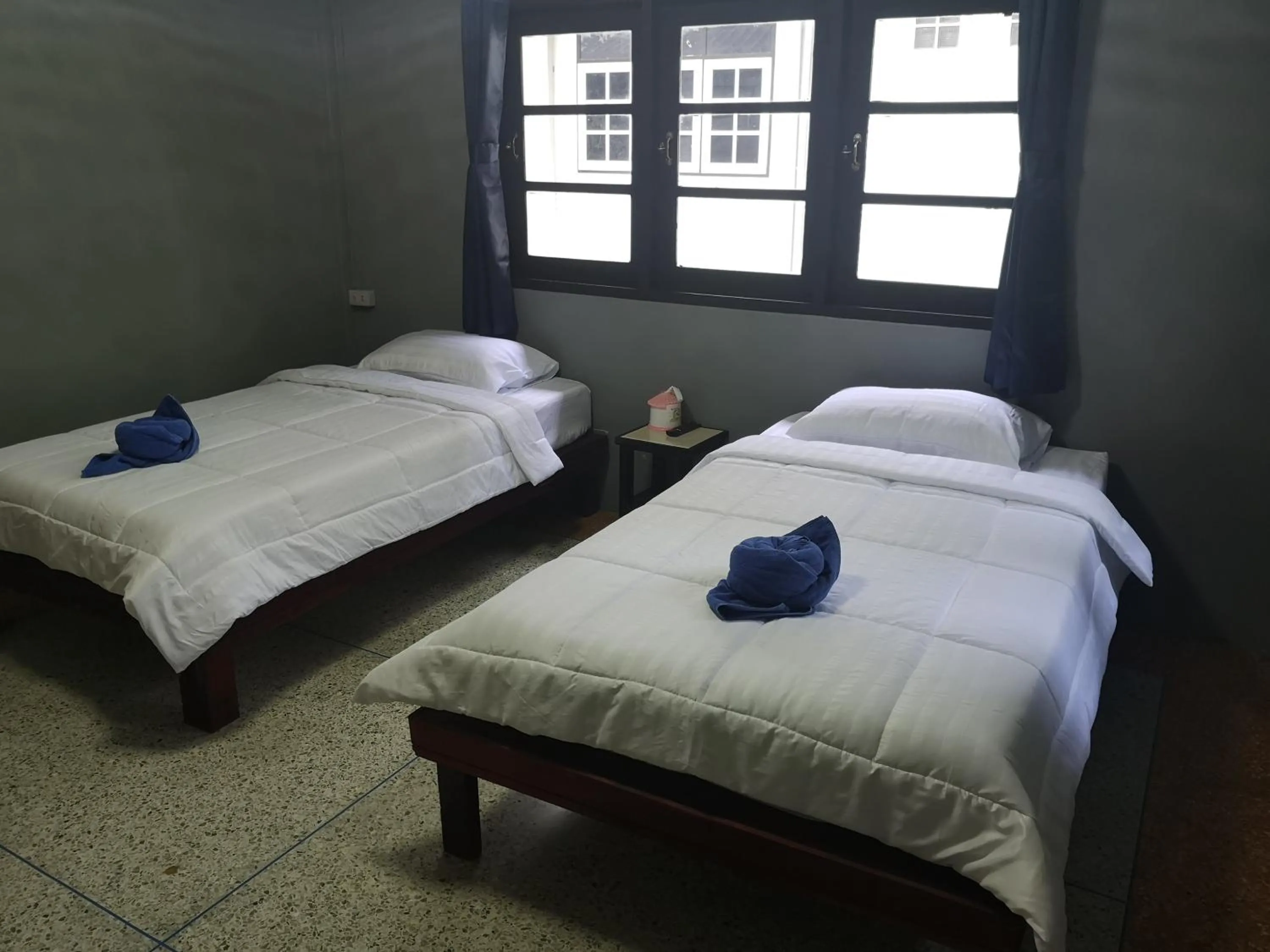 Bed in Buasawan Resort & Restaurant