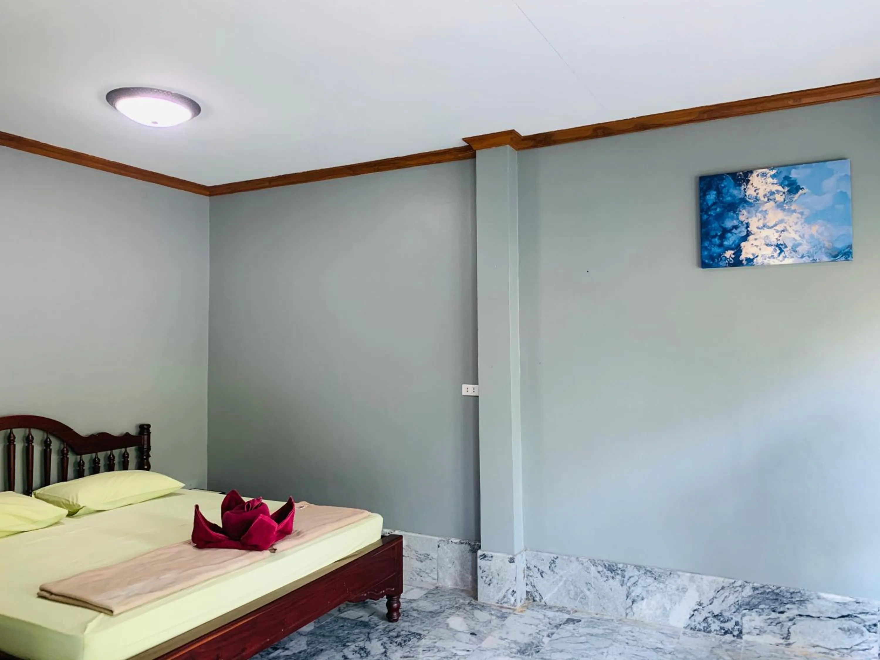 Photo of the whole room, Bed in Buasawan Resort & Restaurant