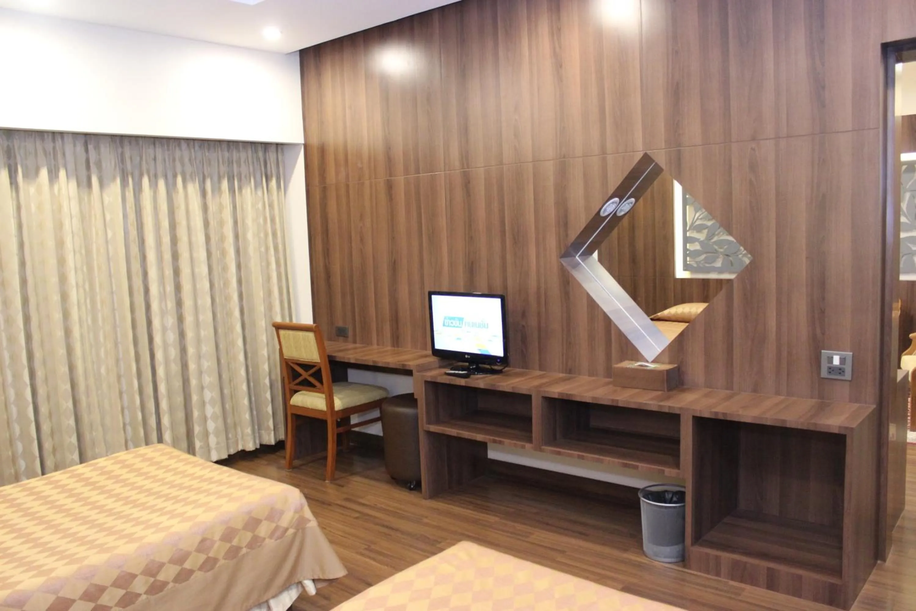 Bed in Charoen Hotel