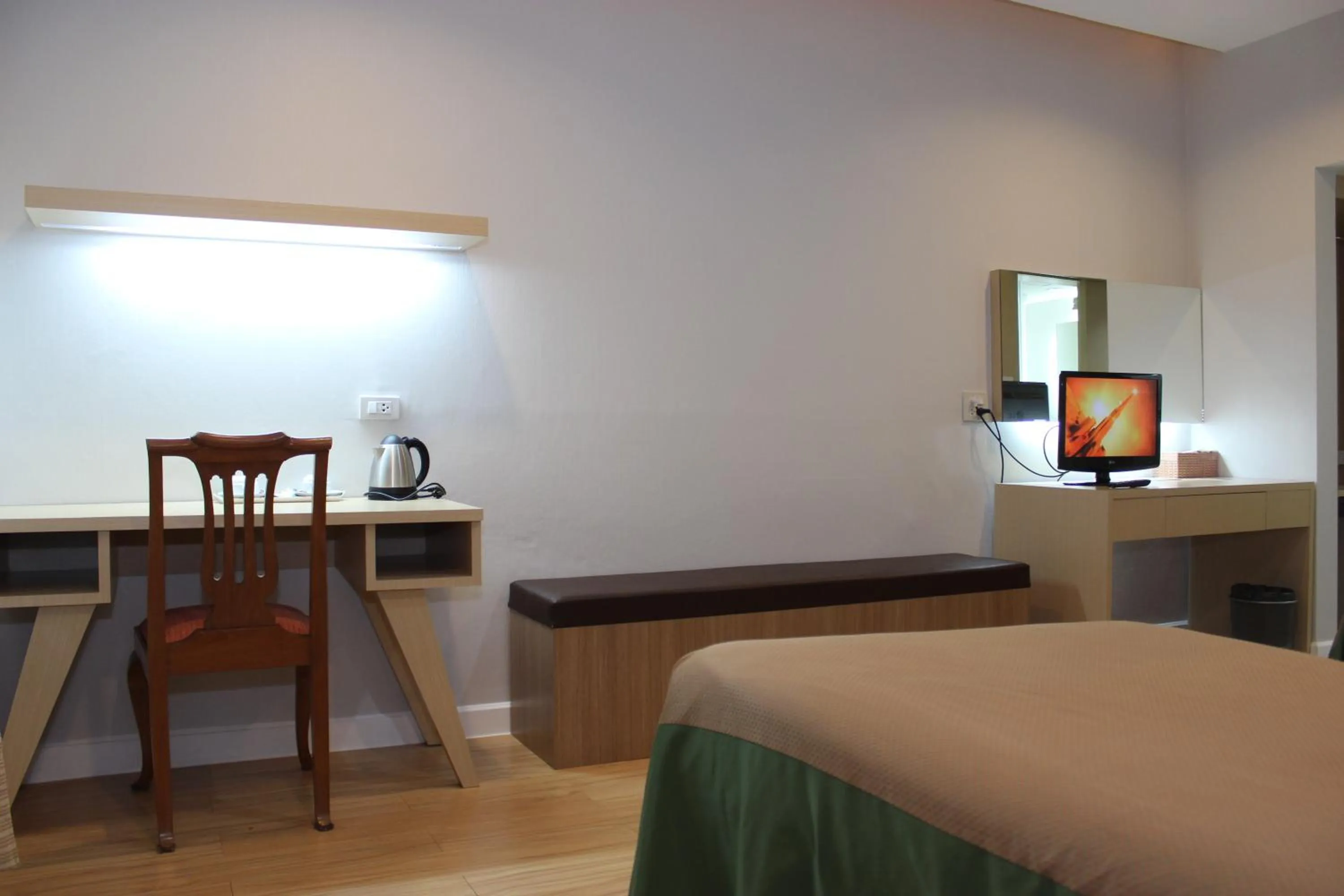 Bed in Charoen Hotel