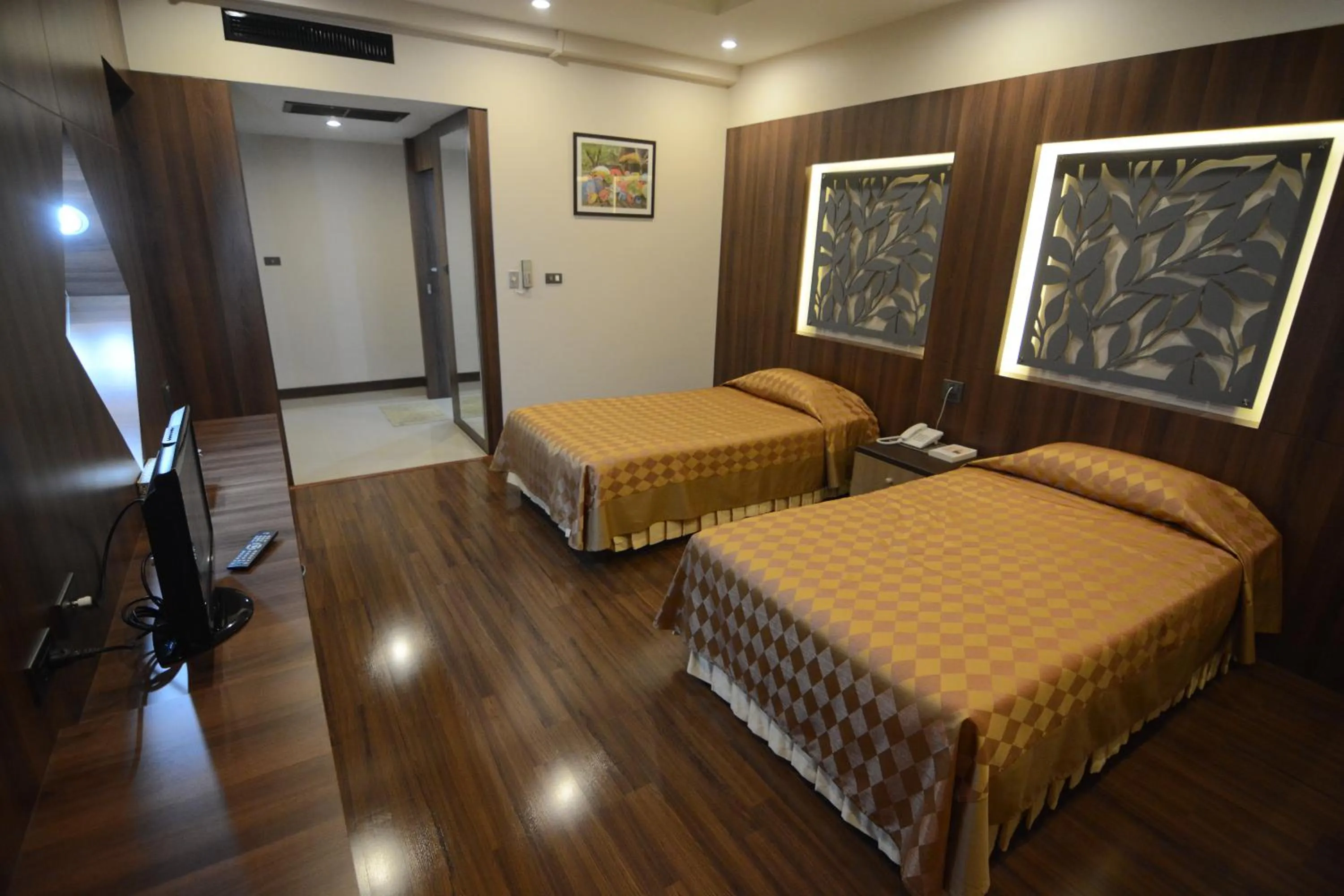 Bed in Charoen Hotel