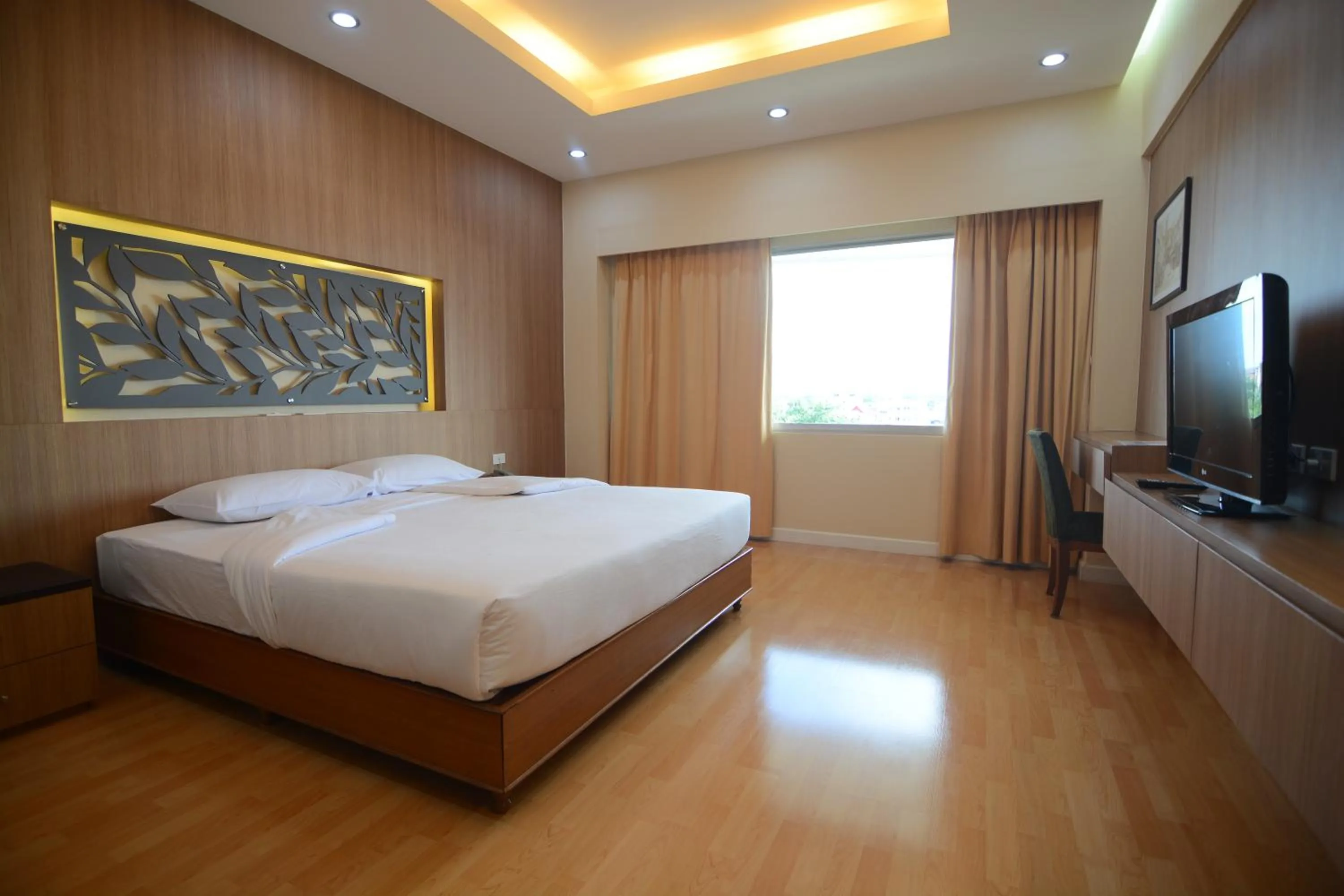 Bed in Charoen Hotel