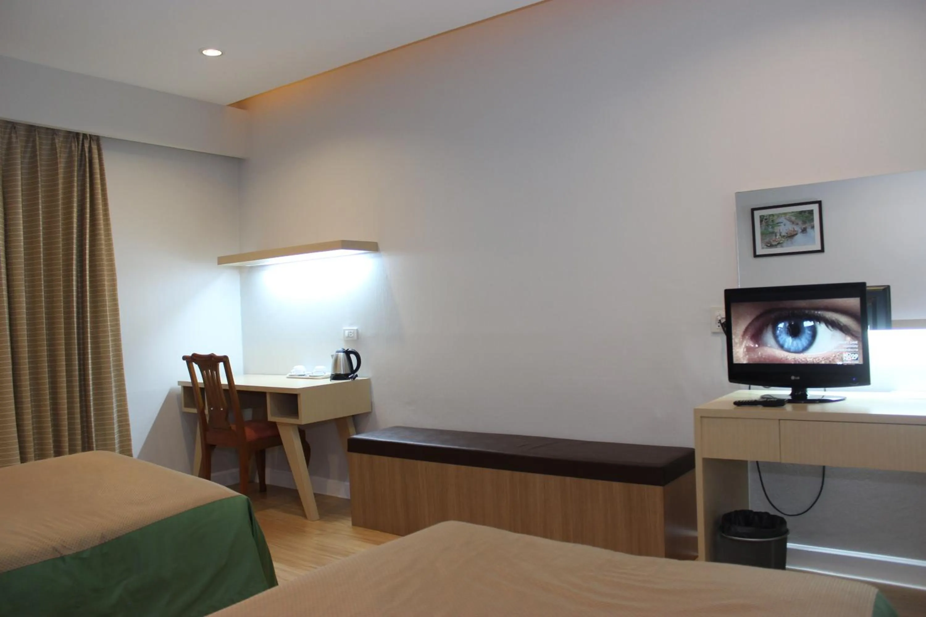 Bed in Charoen Hotel