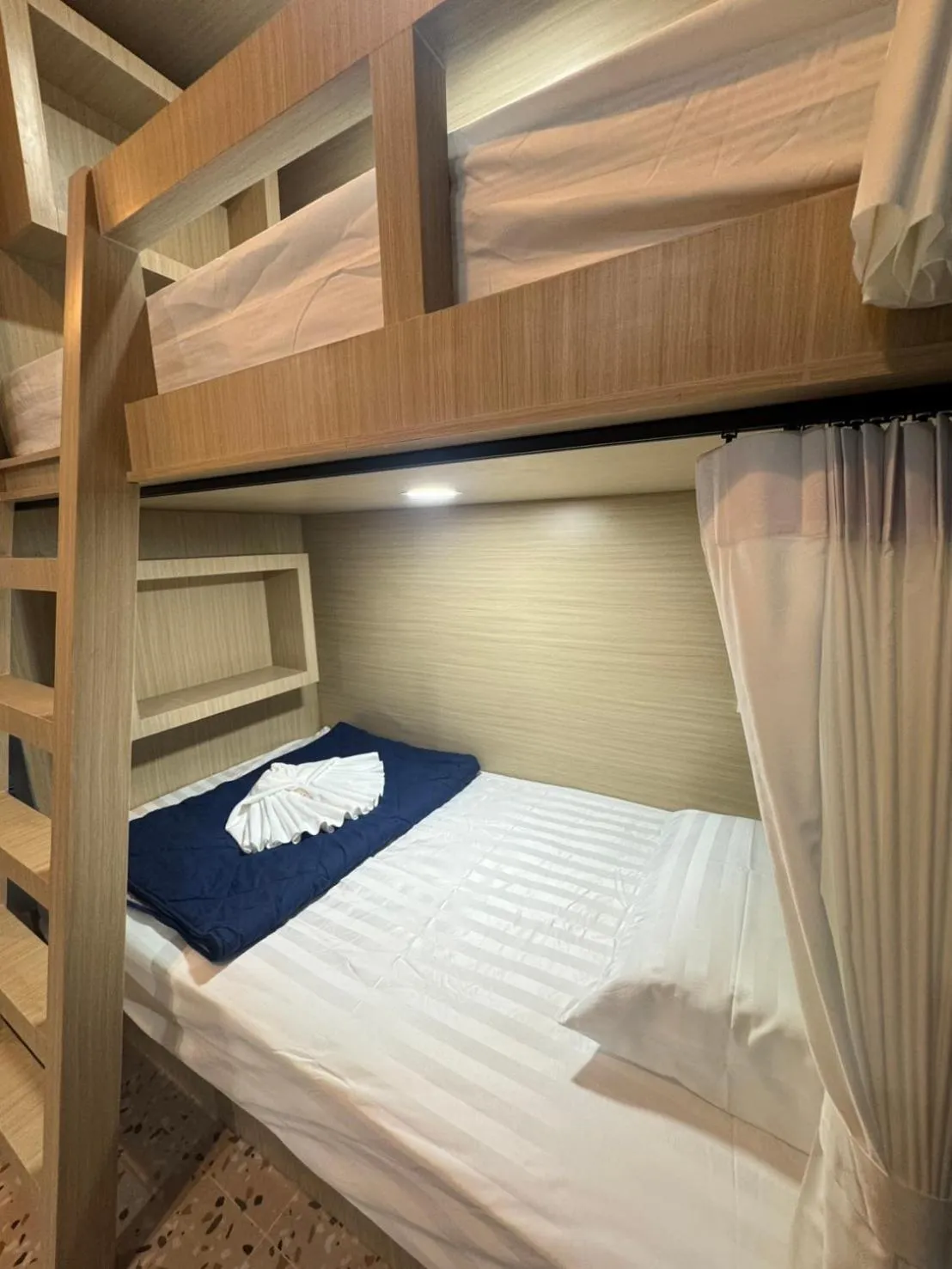 Bed in Rin Beach Resort