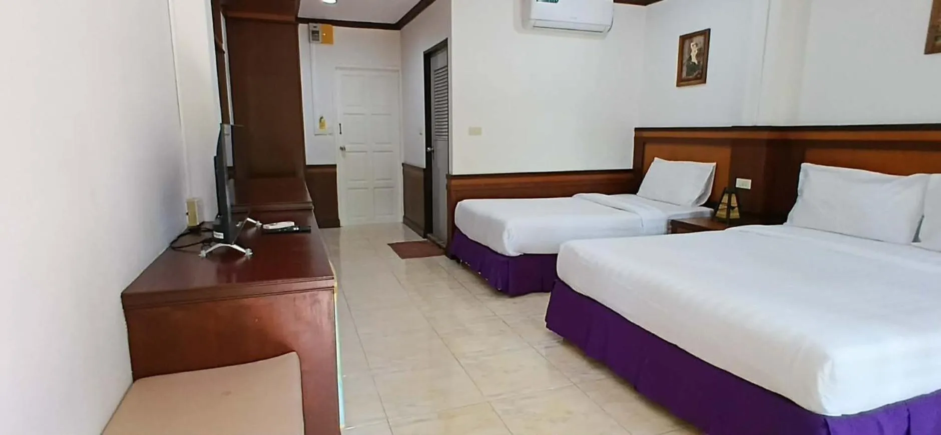 Bed in Rin Beach Resort