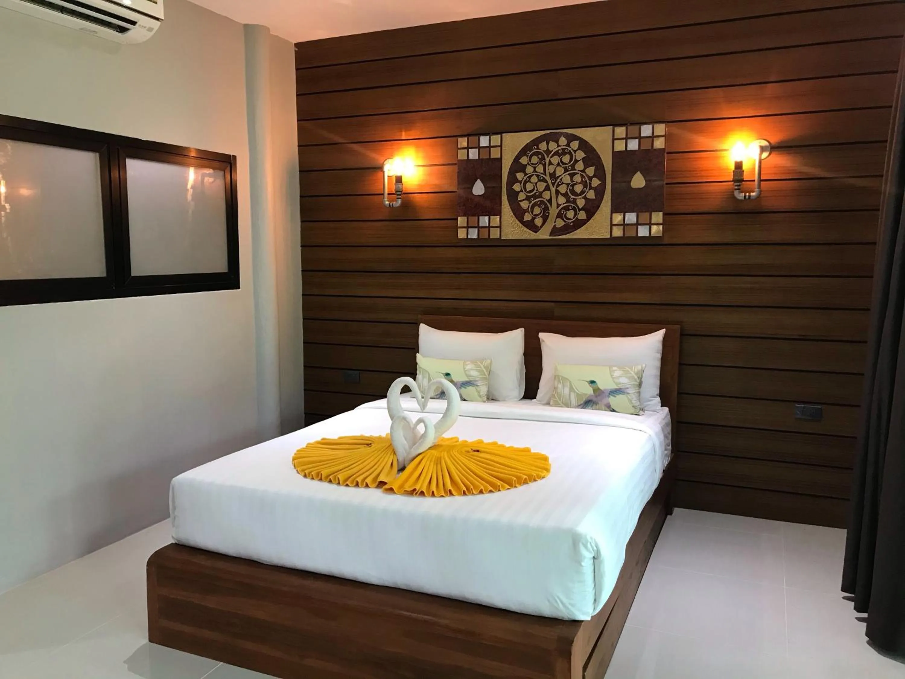 Bed in Rin Beach Resort