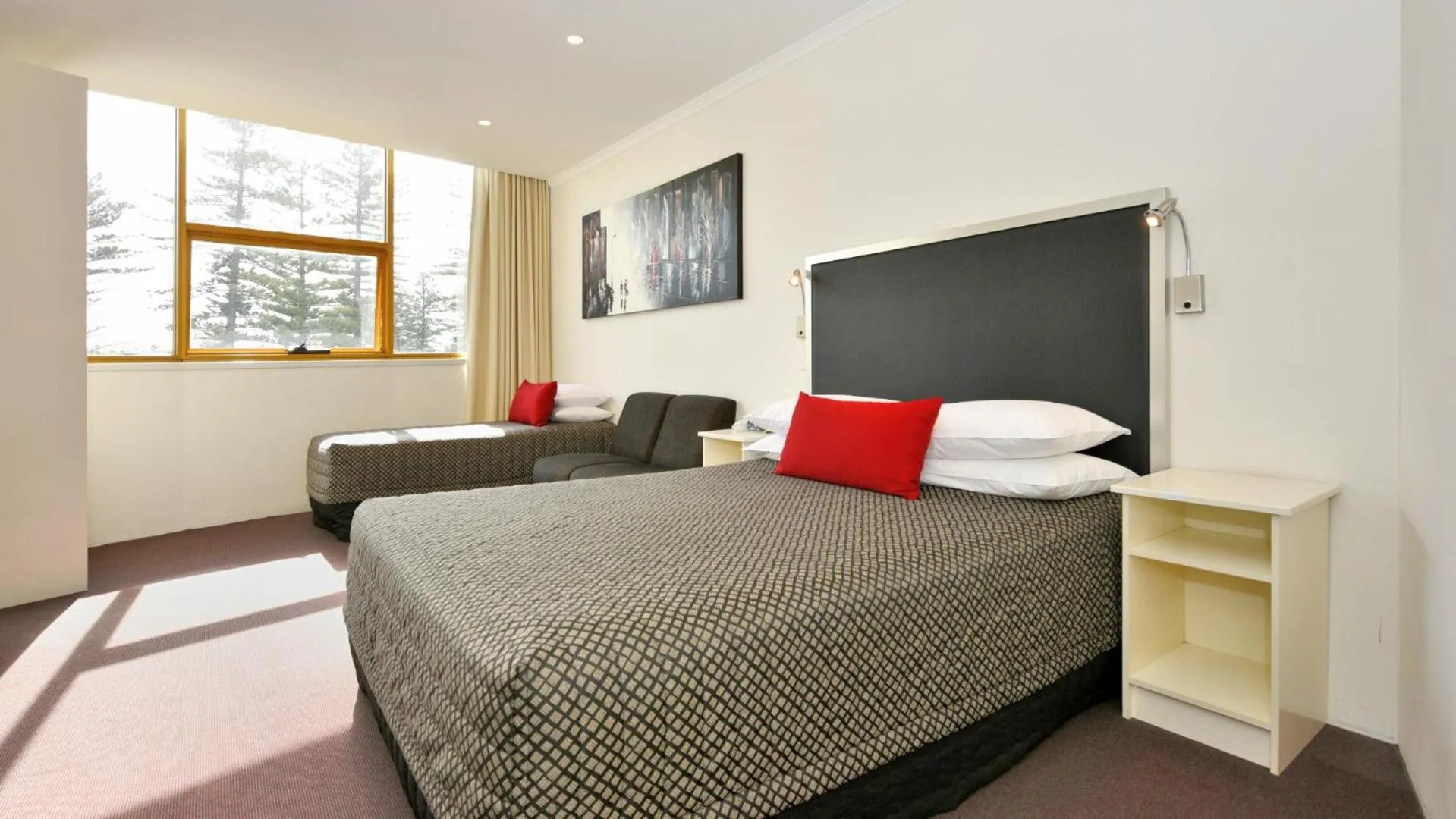 Bed in Atlantic Tower Motor Inn