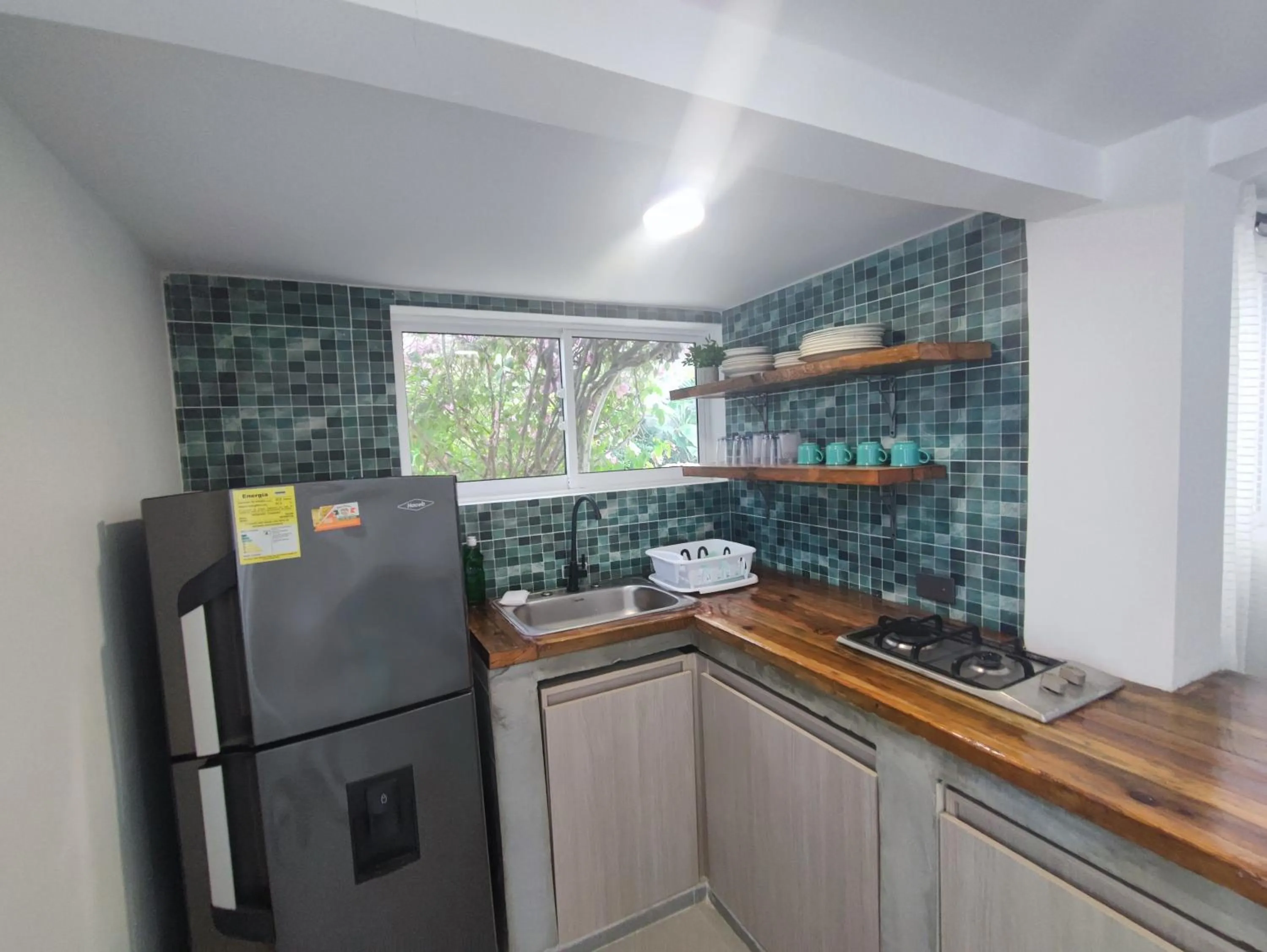 kitchen in Cabañas Green Yard