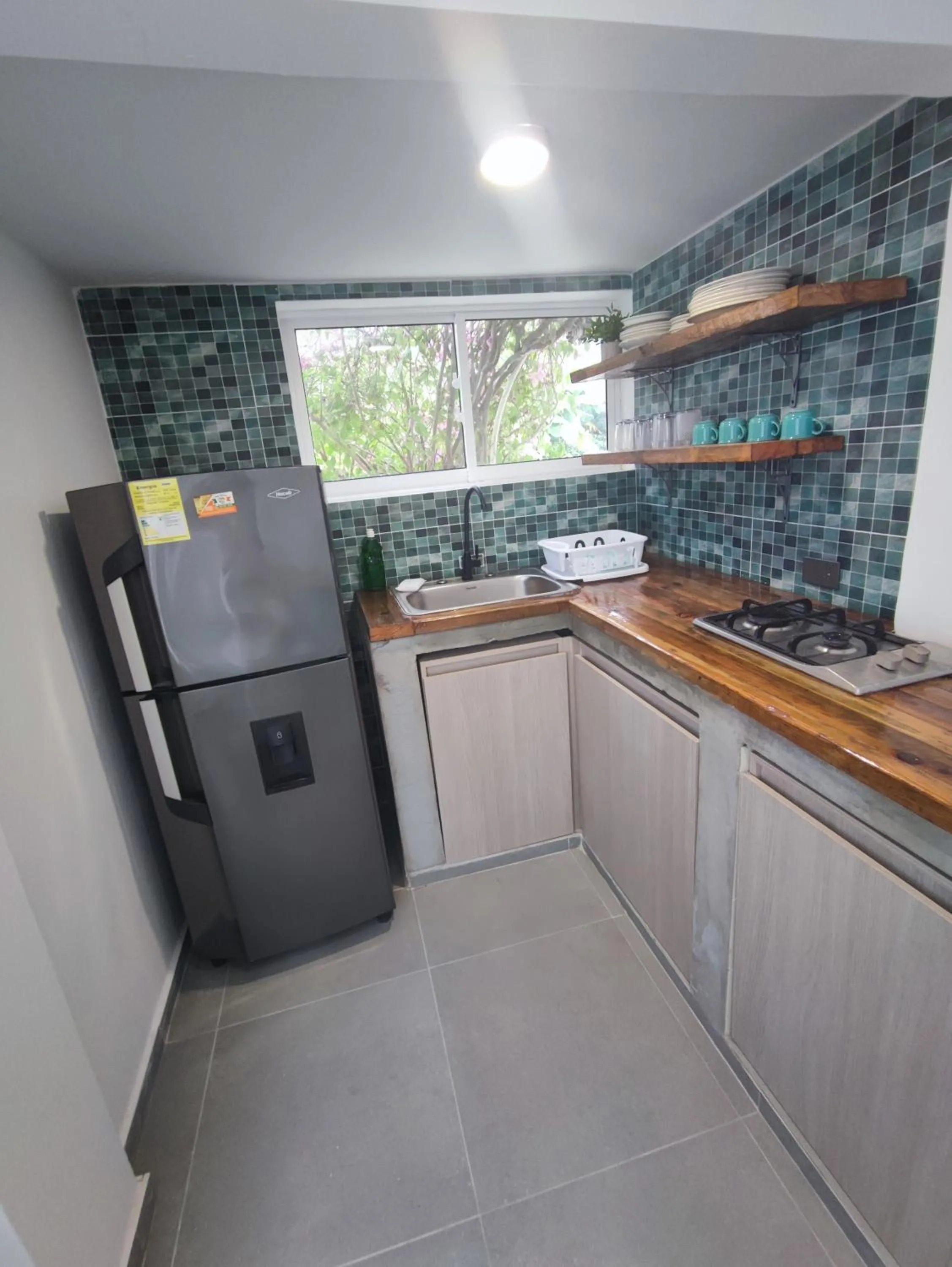 kitchen in Cabañas Green Yard