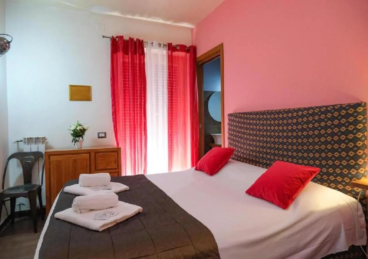 Bed in Aida Charming Rooms