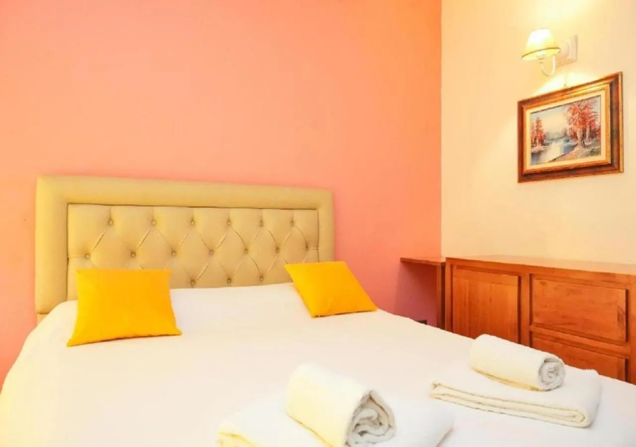 Bed in Aida Charming Rooms