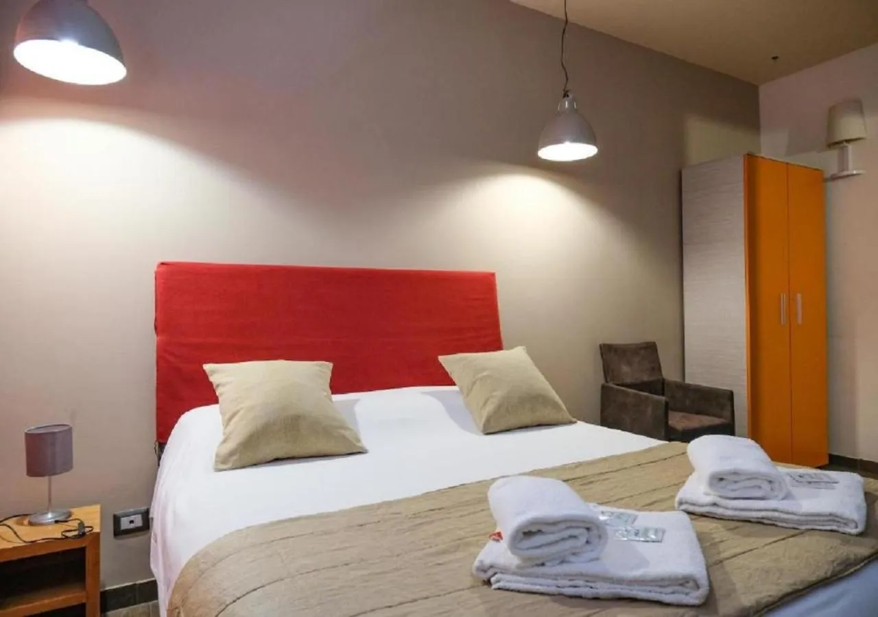 Bed in Aida Charming Rooms