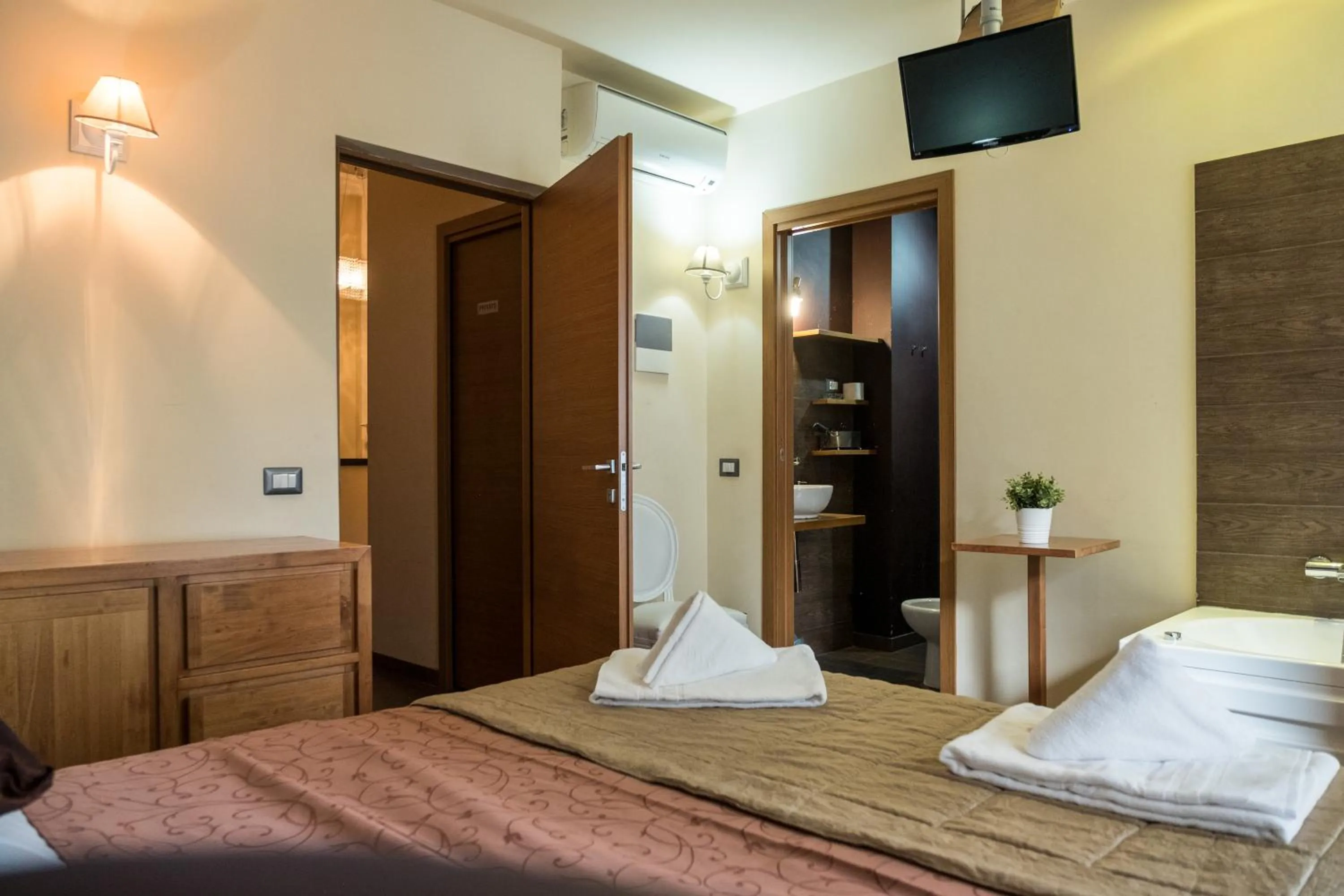 Bed in Aida Charming Rooms