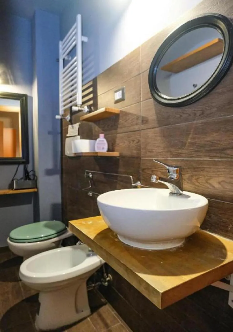 Toilet in Aida Charming Rooms