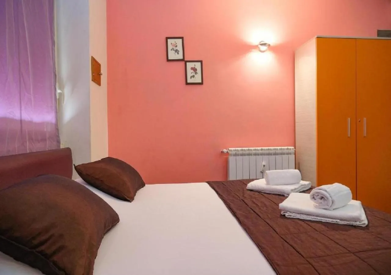 Bed in Aida Charming Rooms