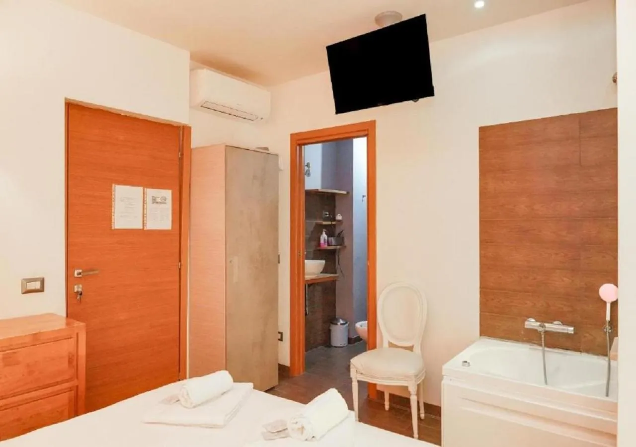 Bed in Aida Charming Rooms