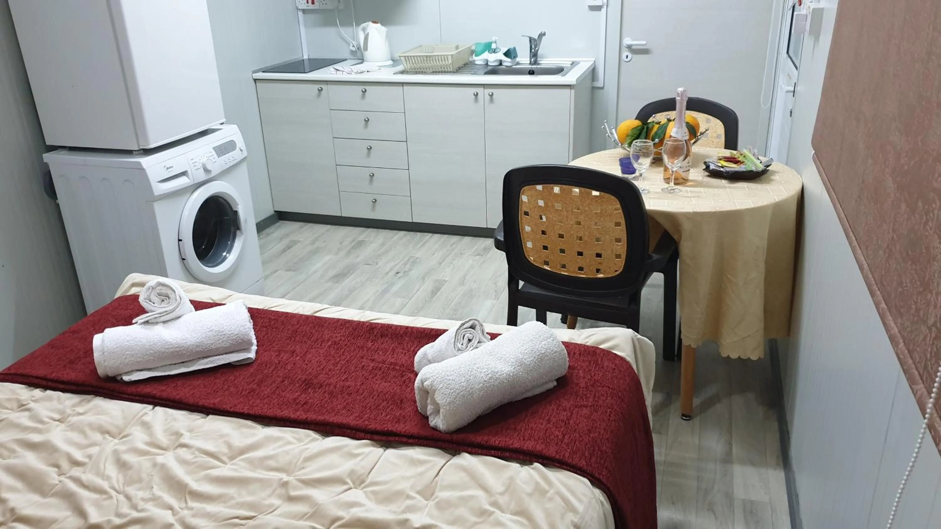 Kitchen or kitchenette, Bed in Astrofegia Apartments Near The Sea