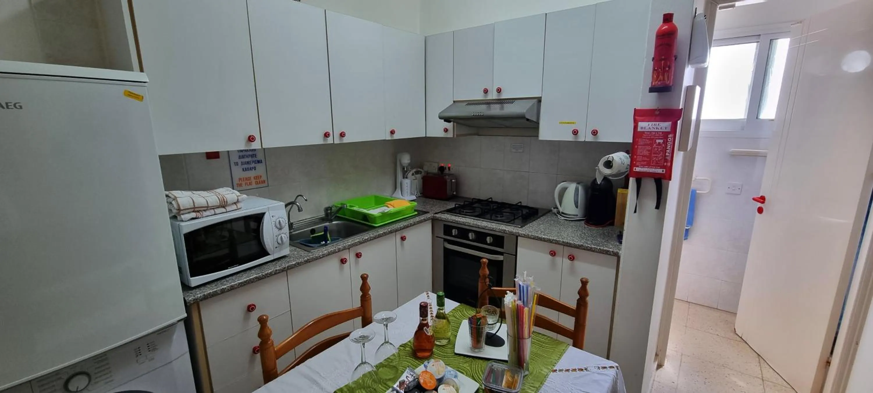 Kitchen or kitchenette in Astrofegia Apartments Near The Sea