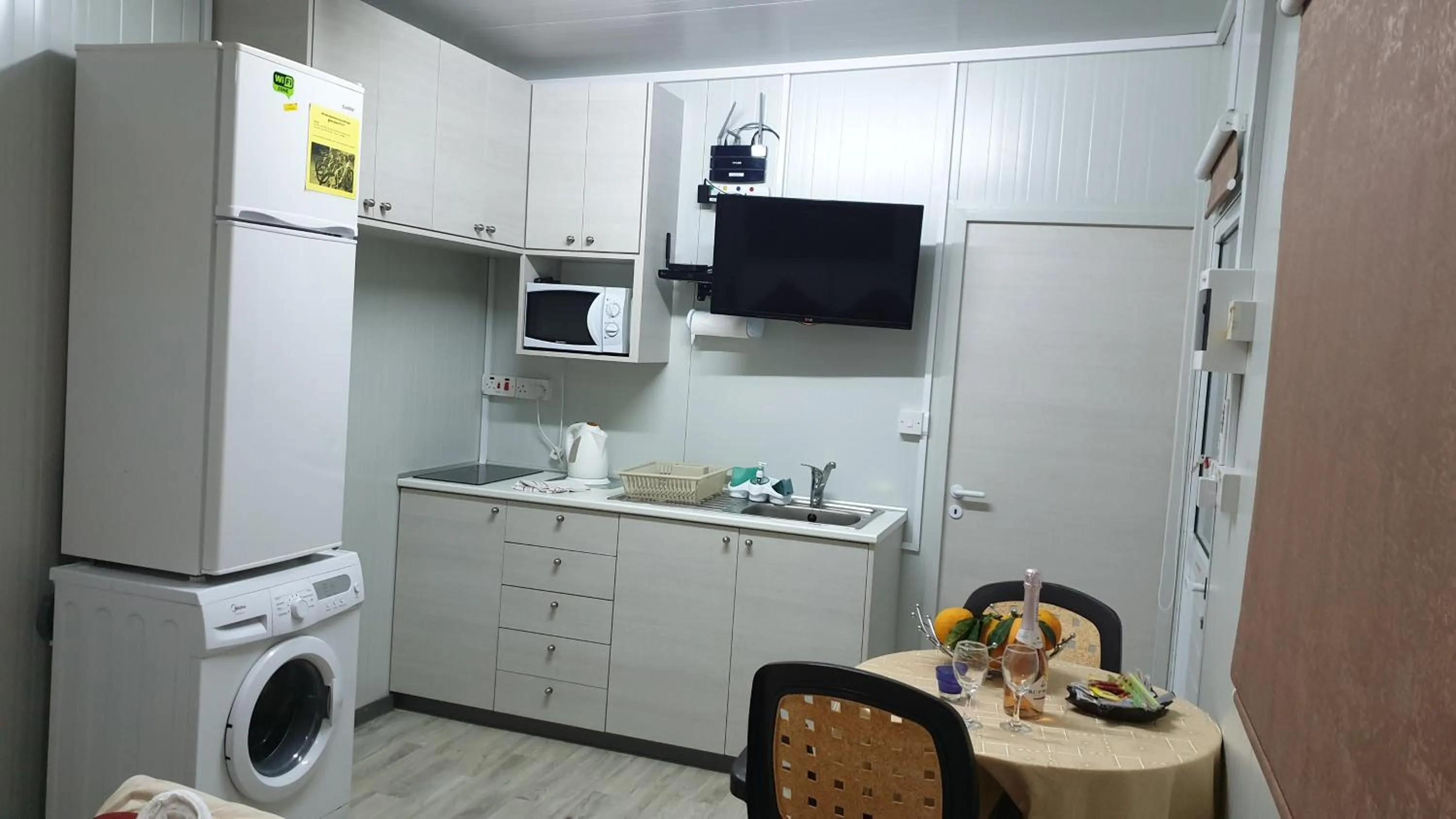 Kitchen or kitchenette in Astrofegia Apartments Near The Sea