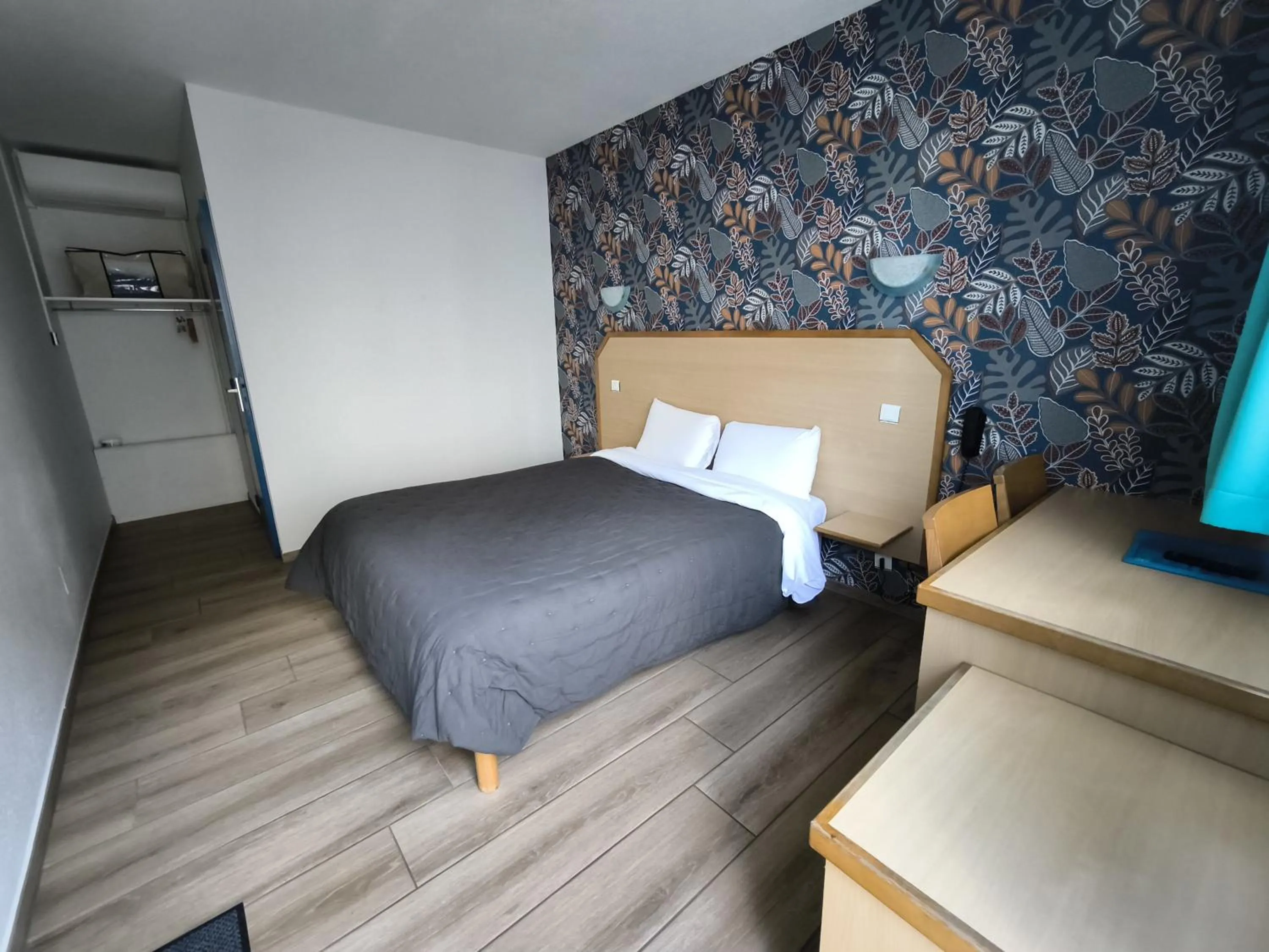 Bed in Hôtel Le Laury's-hôtel calme proche de Rodez avec parking privé gratuit