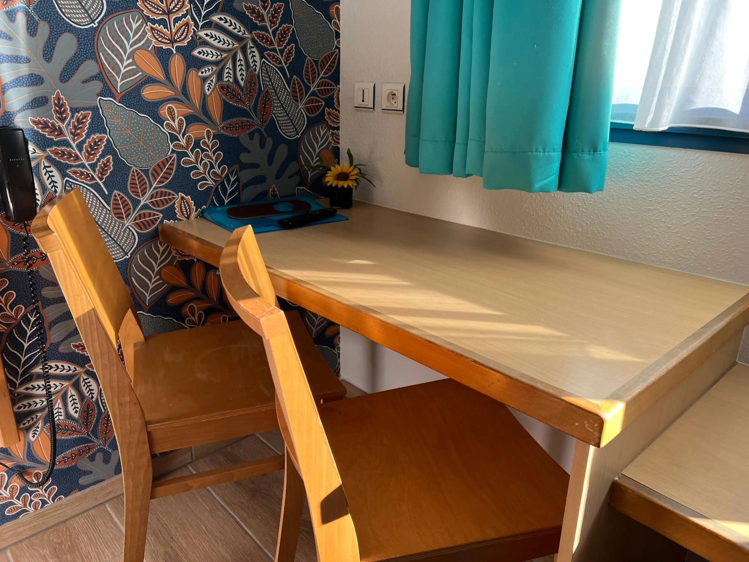 Seating area in Hôtel Le Laury's