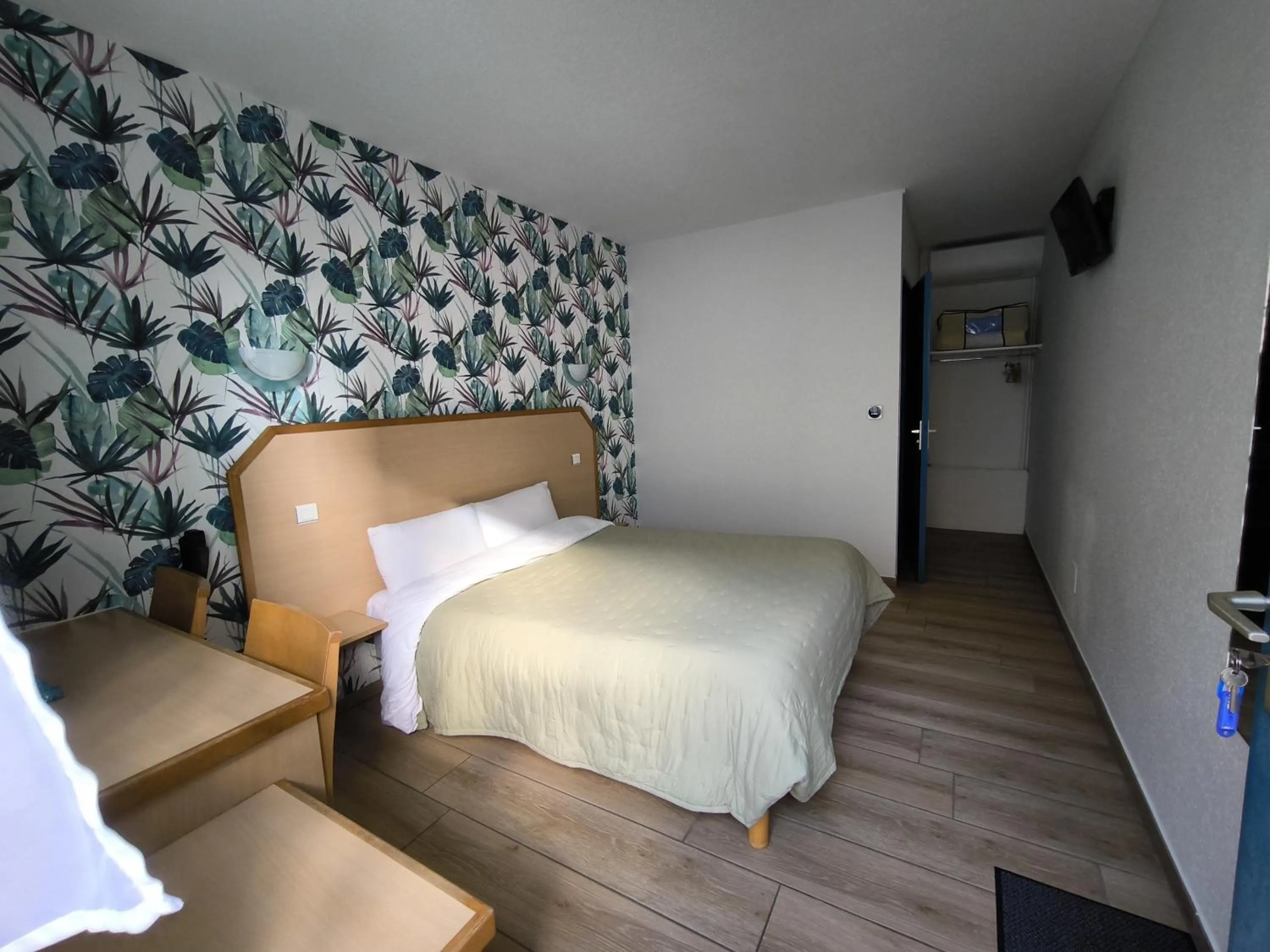 Bed in Hôtel Le Laury's