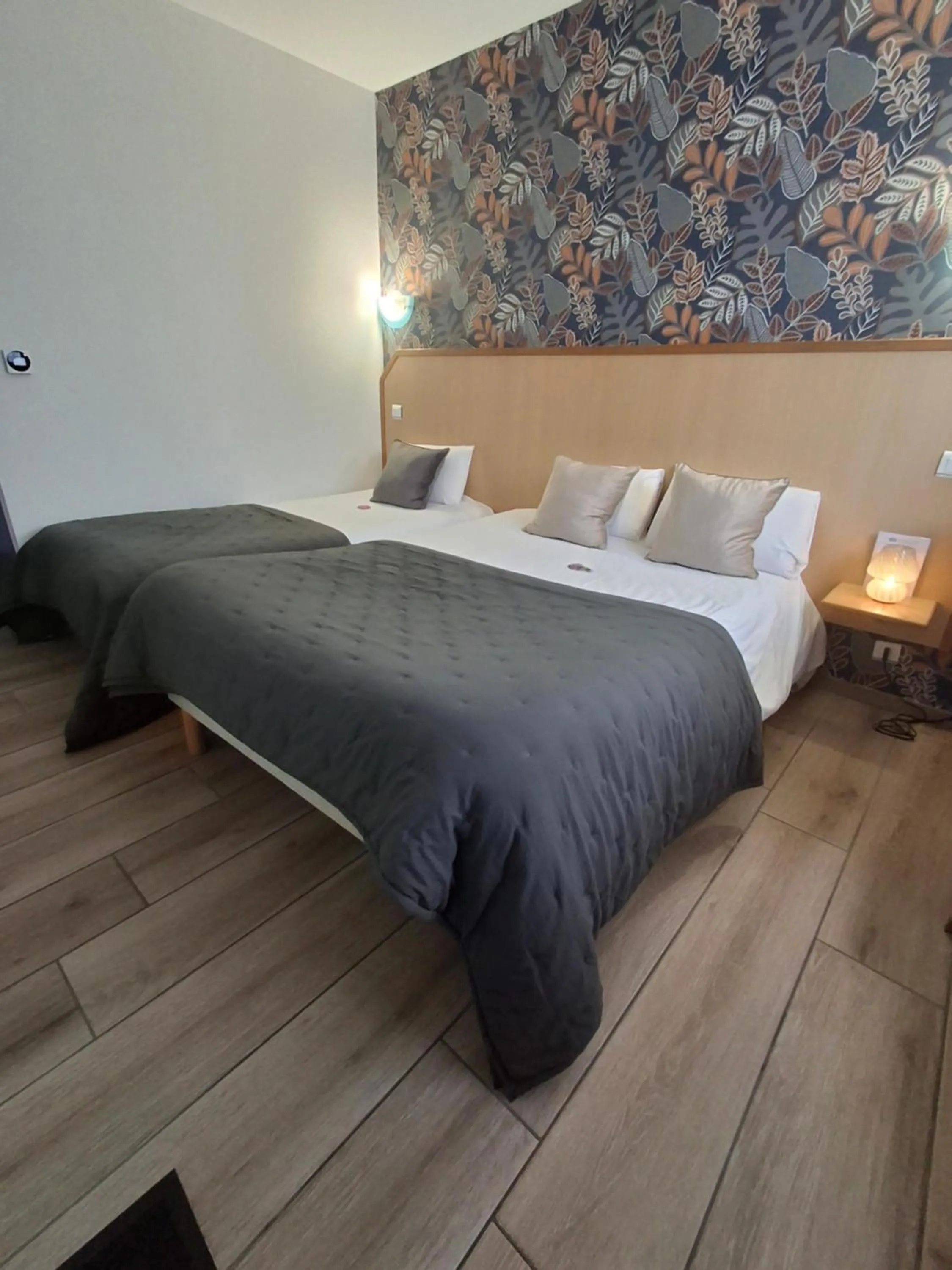 Bed in Hôtel Le Laury's