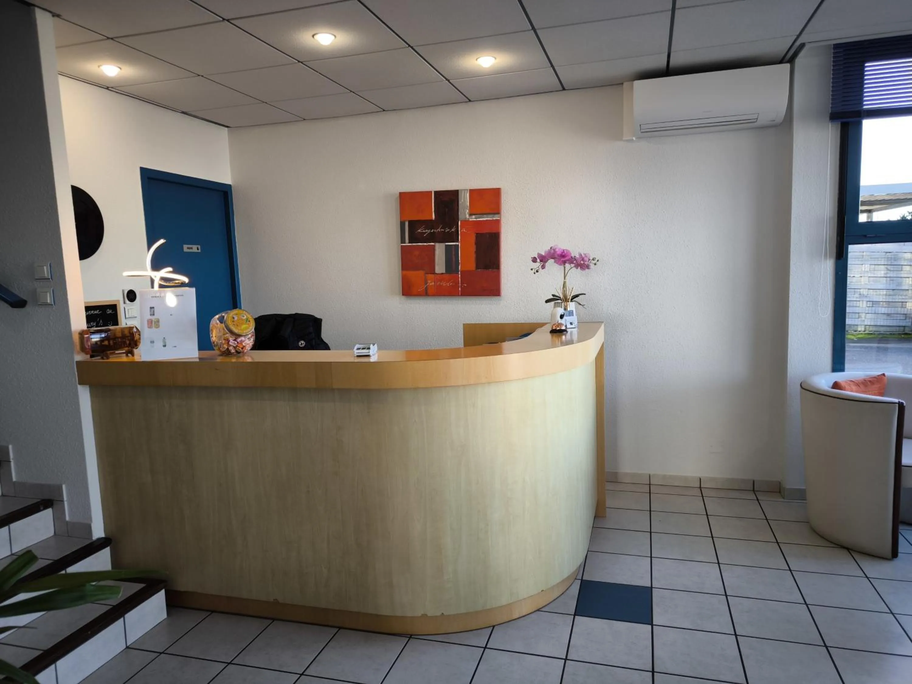 Lobby or reception in Hôtel Le Laury's