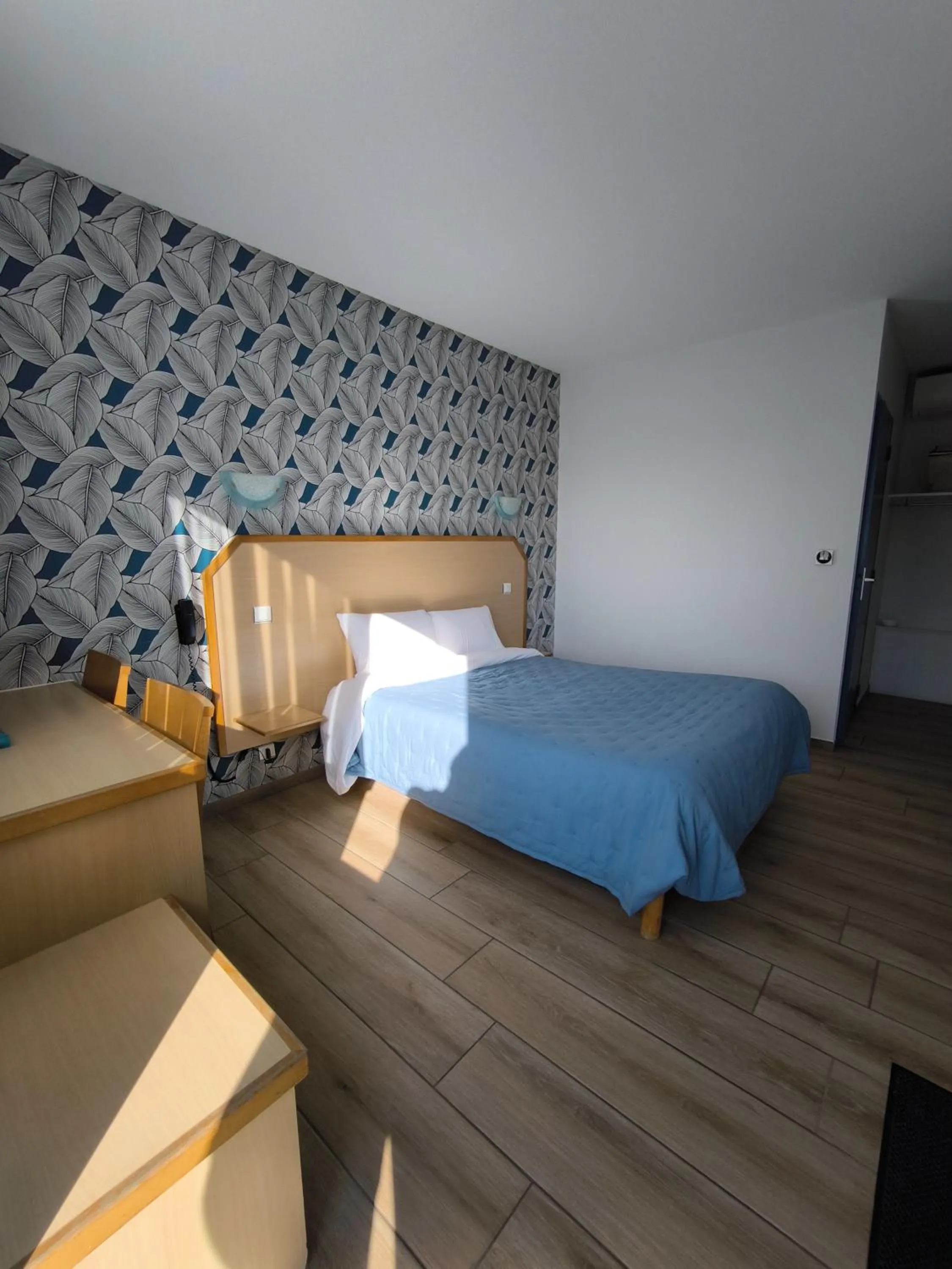 Bed in Hôtel Le Laury's