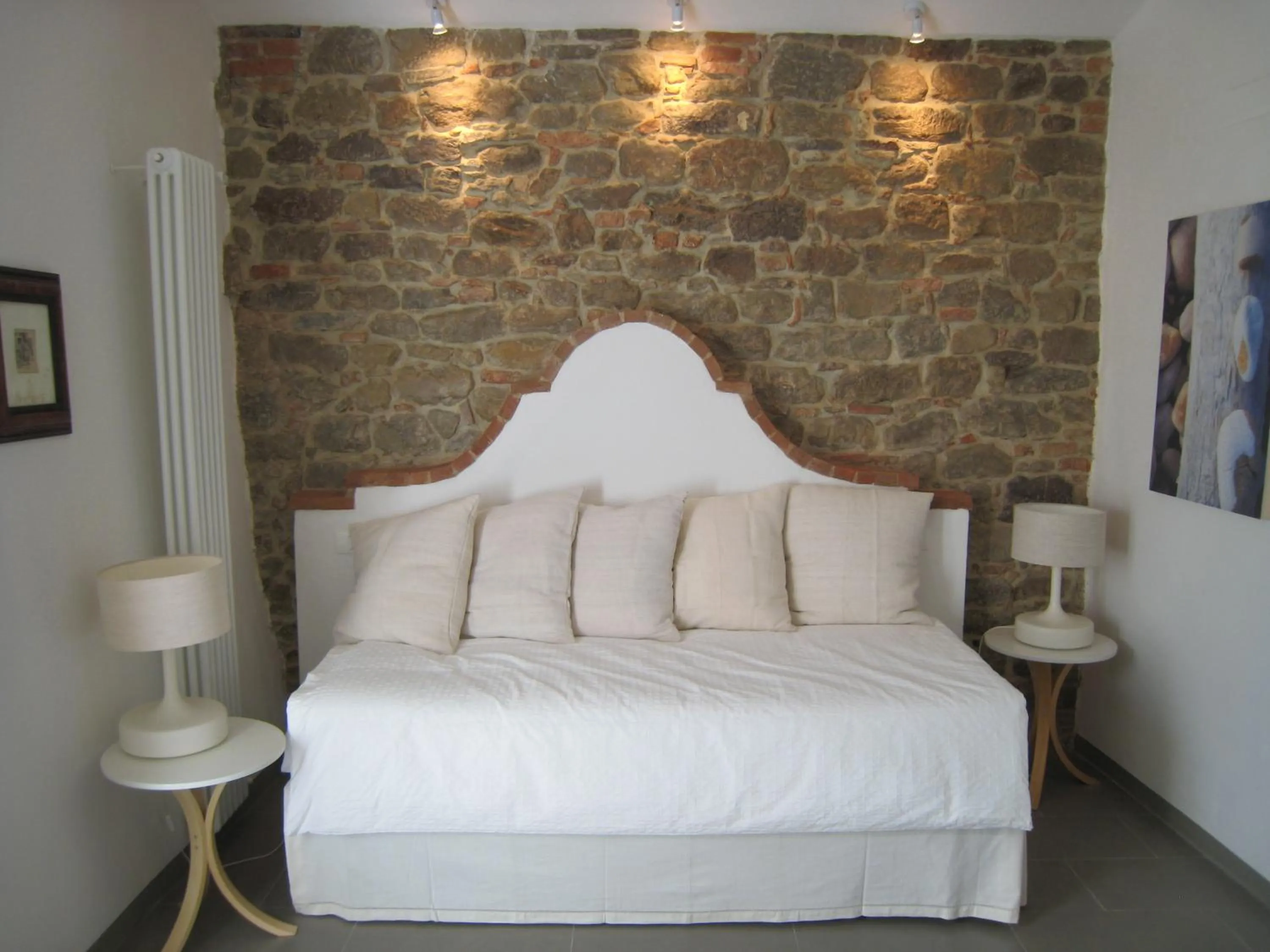 Photo of the whole room, Bed in Fontelunga Hotel & Villas