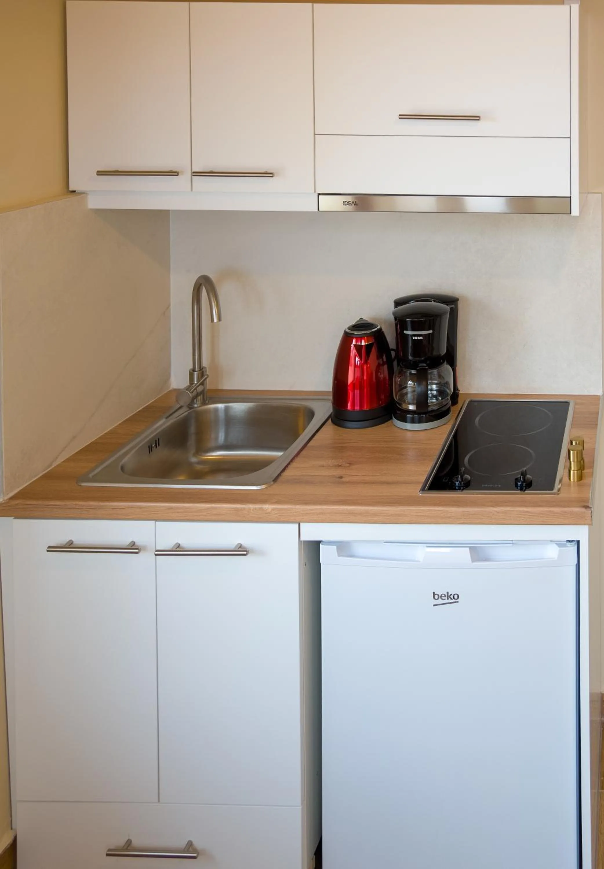 Kitchen or kitchenette in Elma Suites