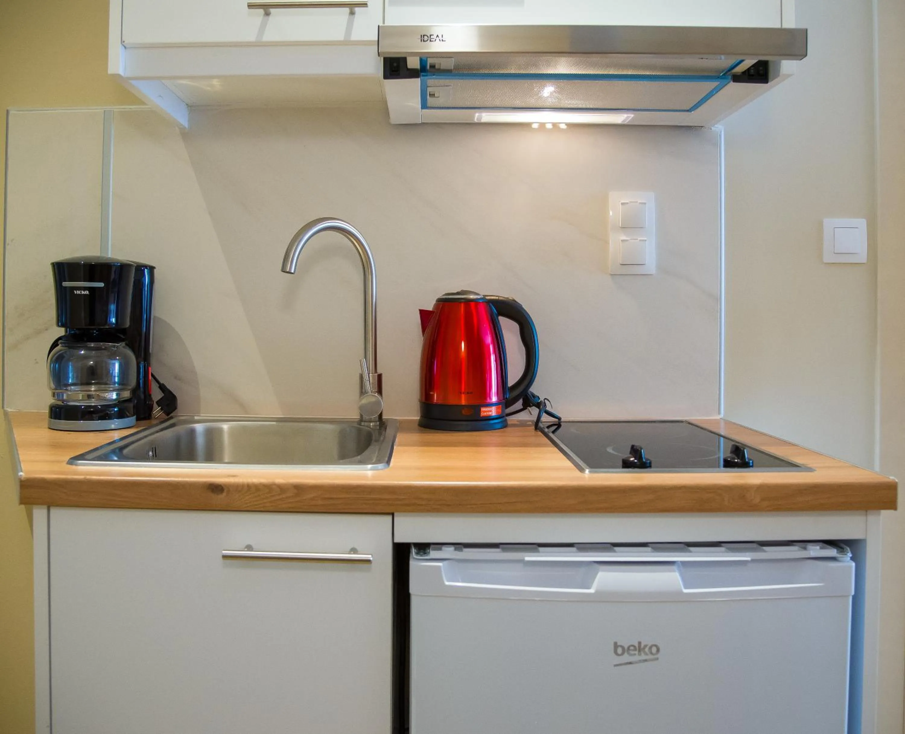 Kitchen or kitchenette in Elma Suites